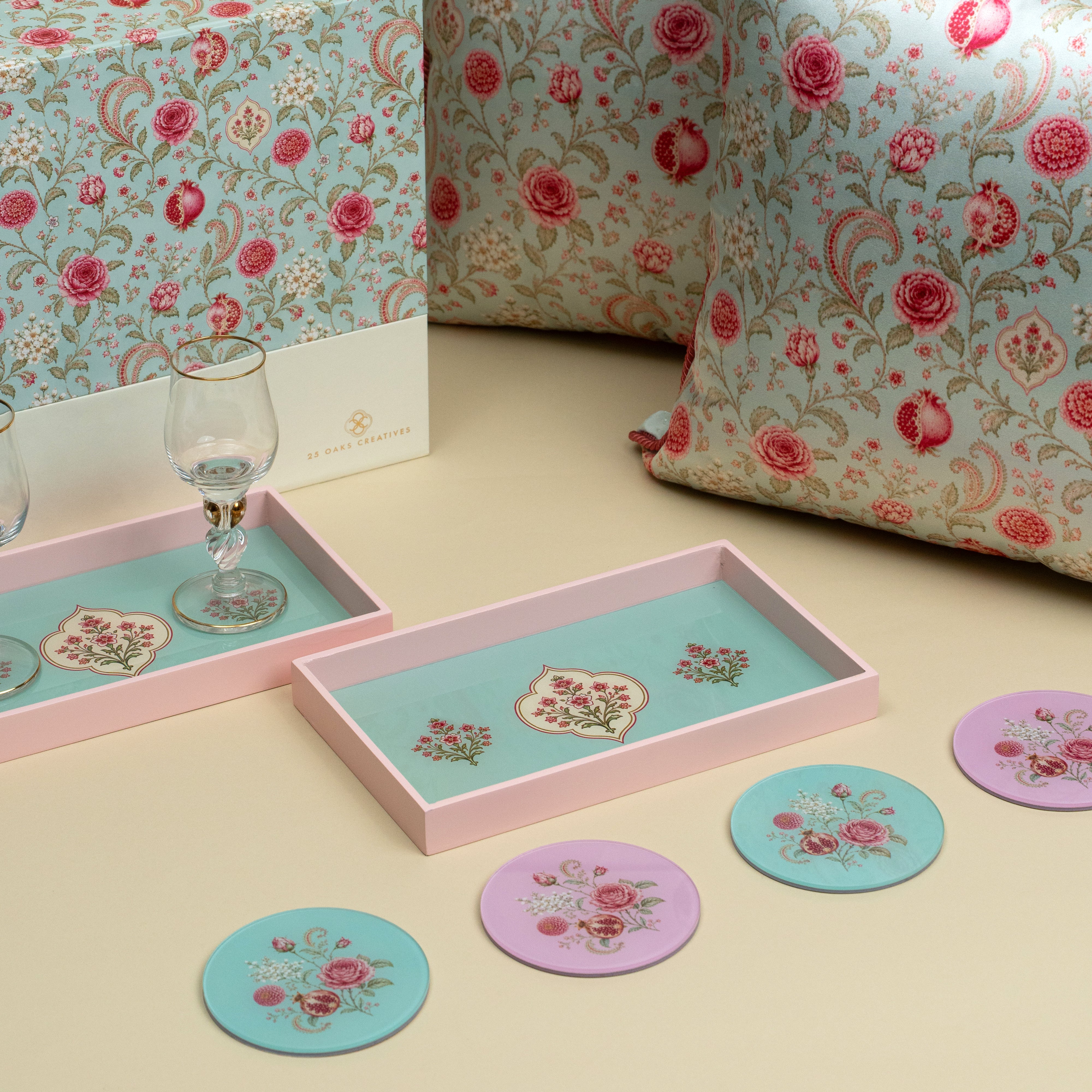 Floral home decor gift set featuring printed cushions, trays and matching coasters