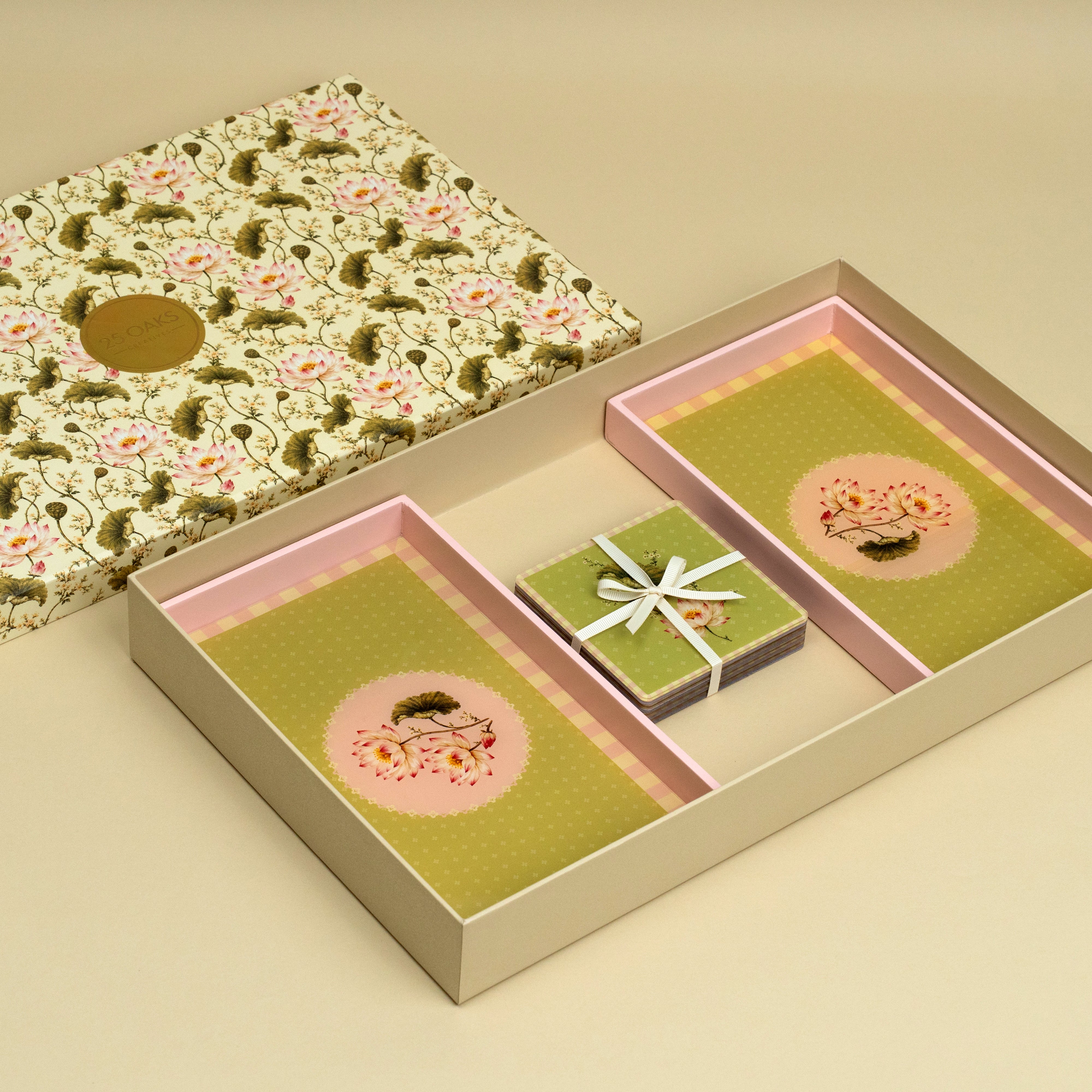 The Aperitif festive gift set with two floral trays and four matching coasters
