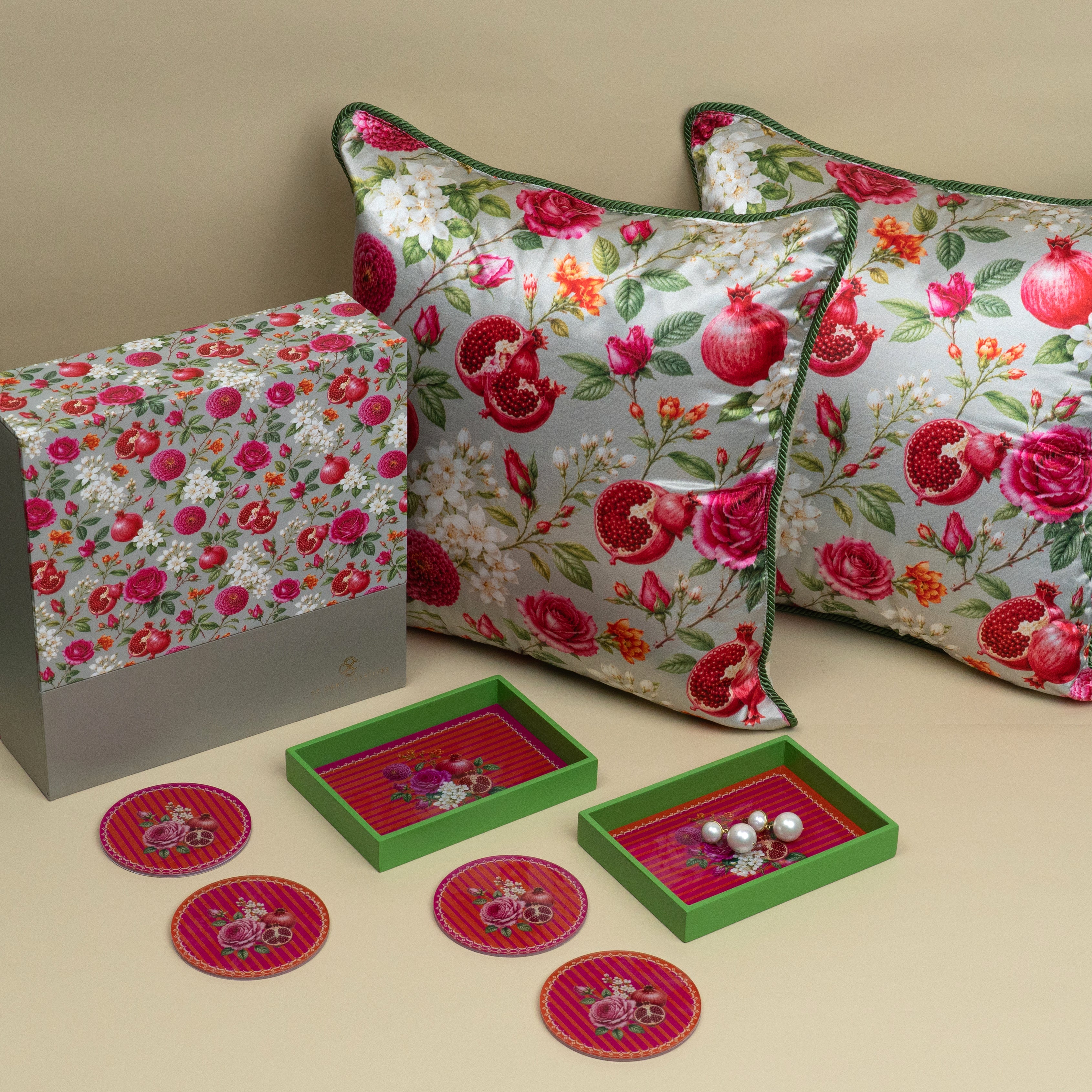 The Retreat festive gift set with floral cushion covers, trinket trays and coasters