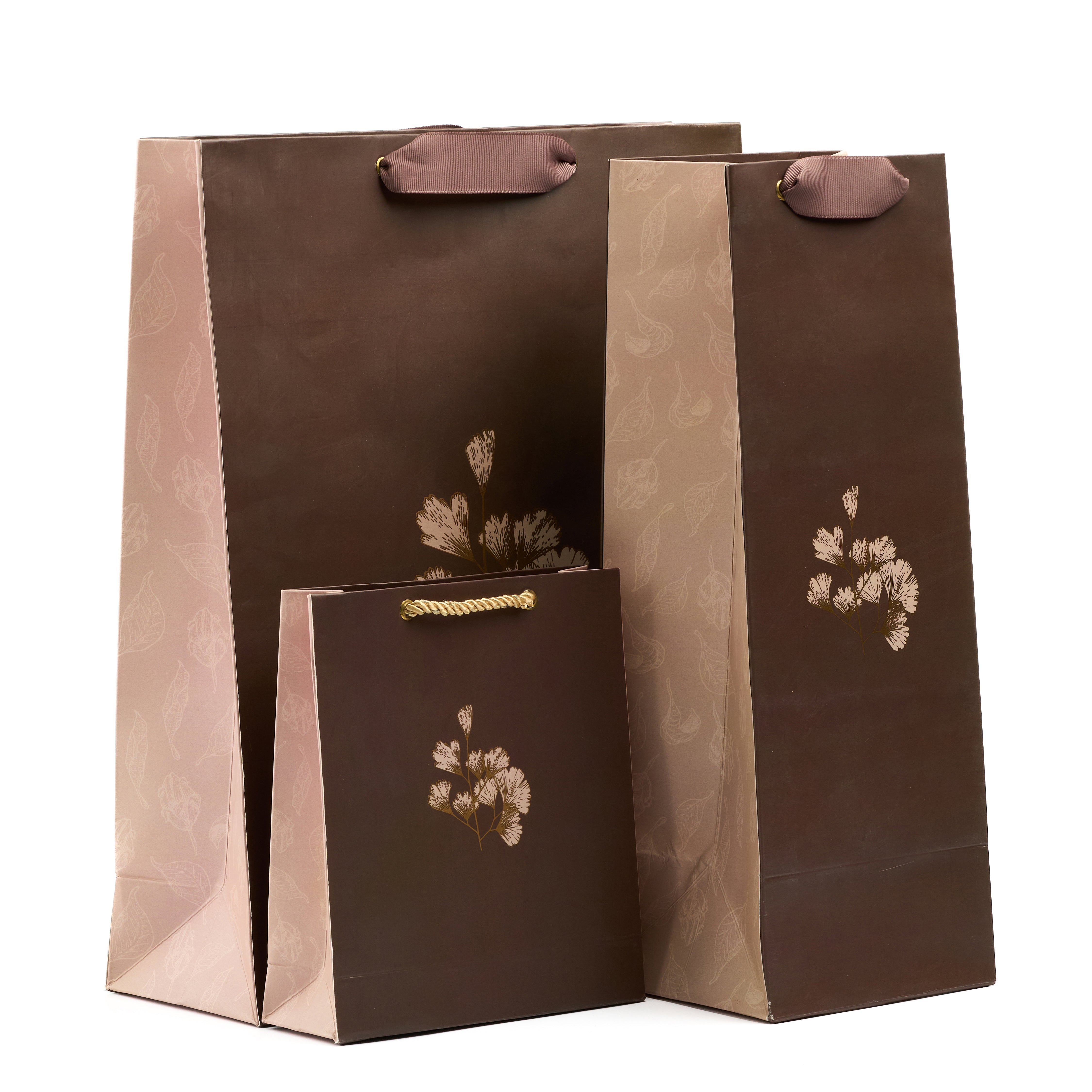 Grande gift bag set featuring shirt, medium, small, and wine bags in an elegant brown-and-beige floral theme, ideal for luxurious festive gifting.