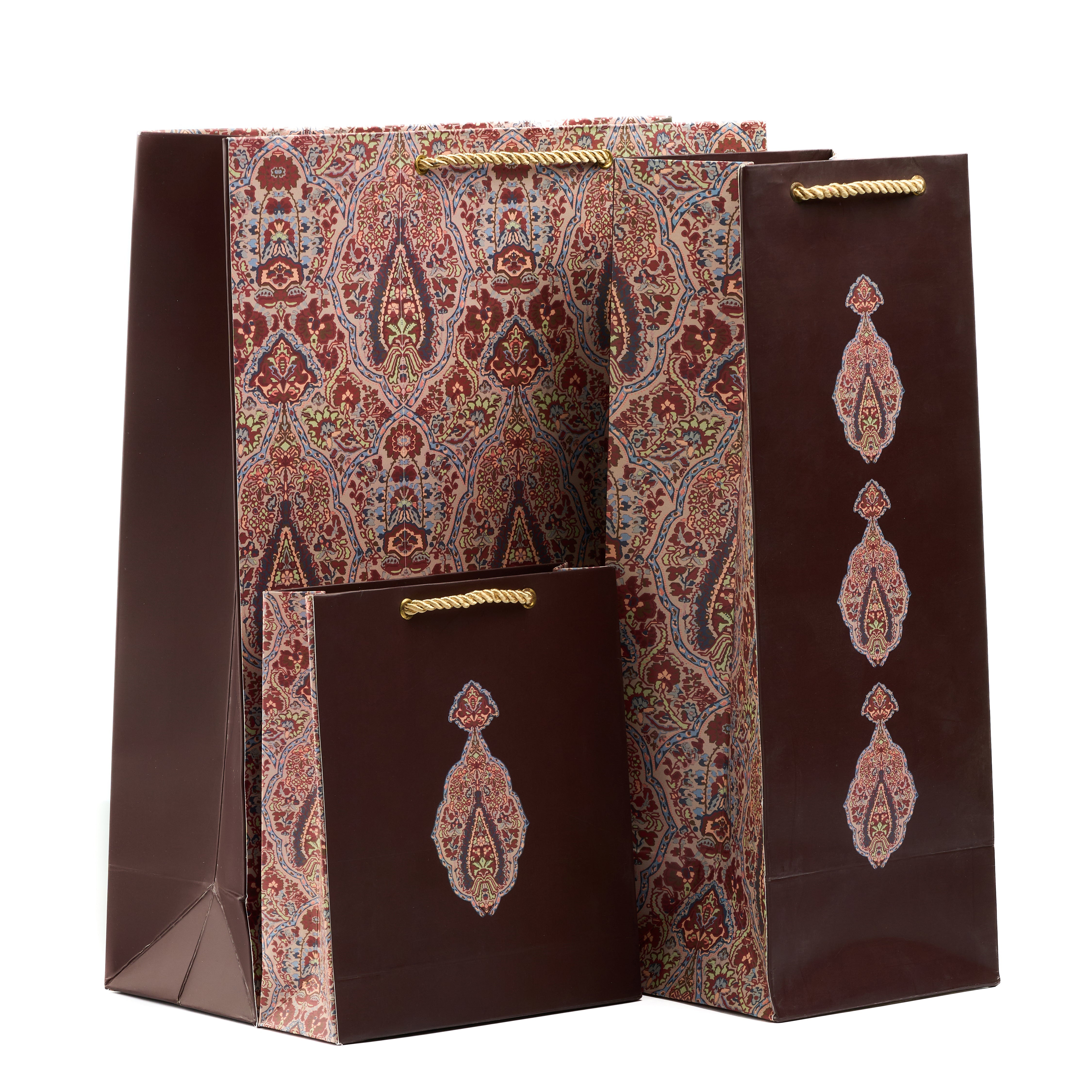 Grande midnight floral gift bag set with shirt, medium, small, and wine bags—made for luxe nighttime gifting.