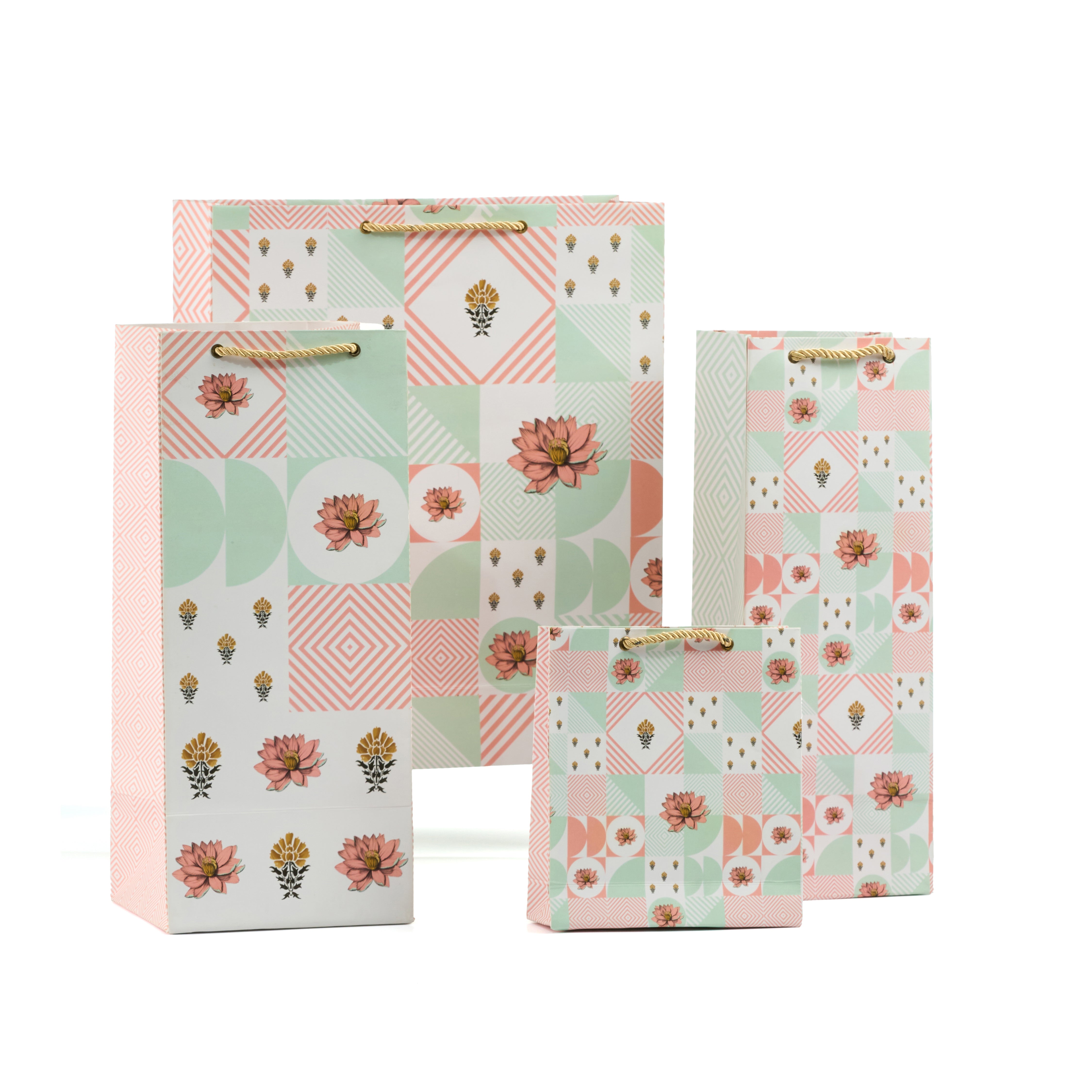 Grande beige-green floral gift bag set across all sizes, designed for elegant and eco-inspired occasions.
