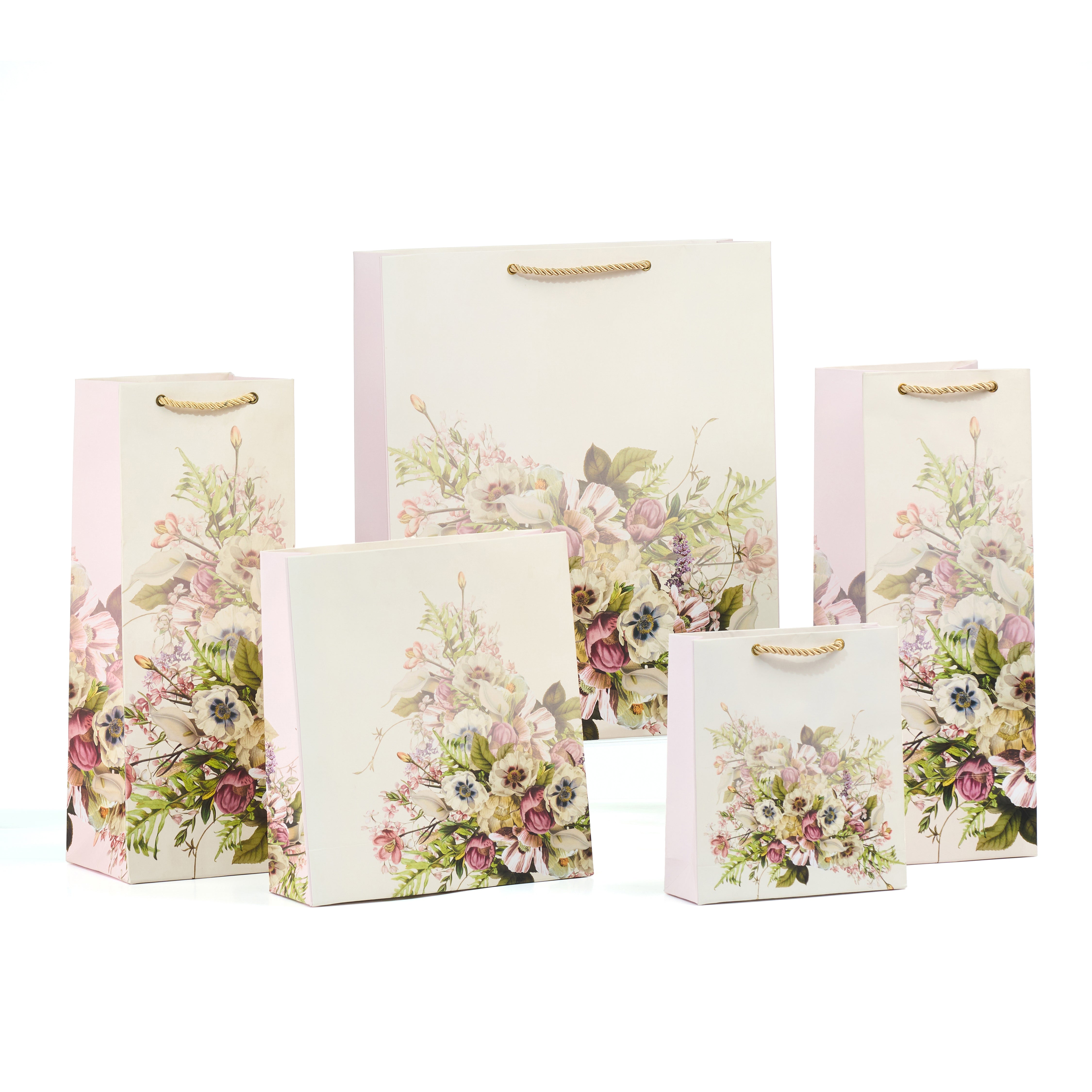 Grande gift bag set featuring pastel floral bouquets in soft white tones across all sizes—perfect for romantic, artistic luxury gifting.