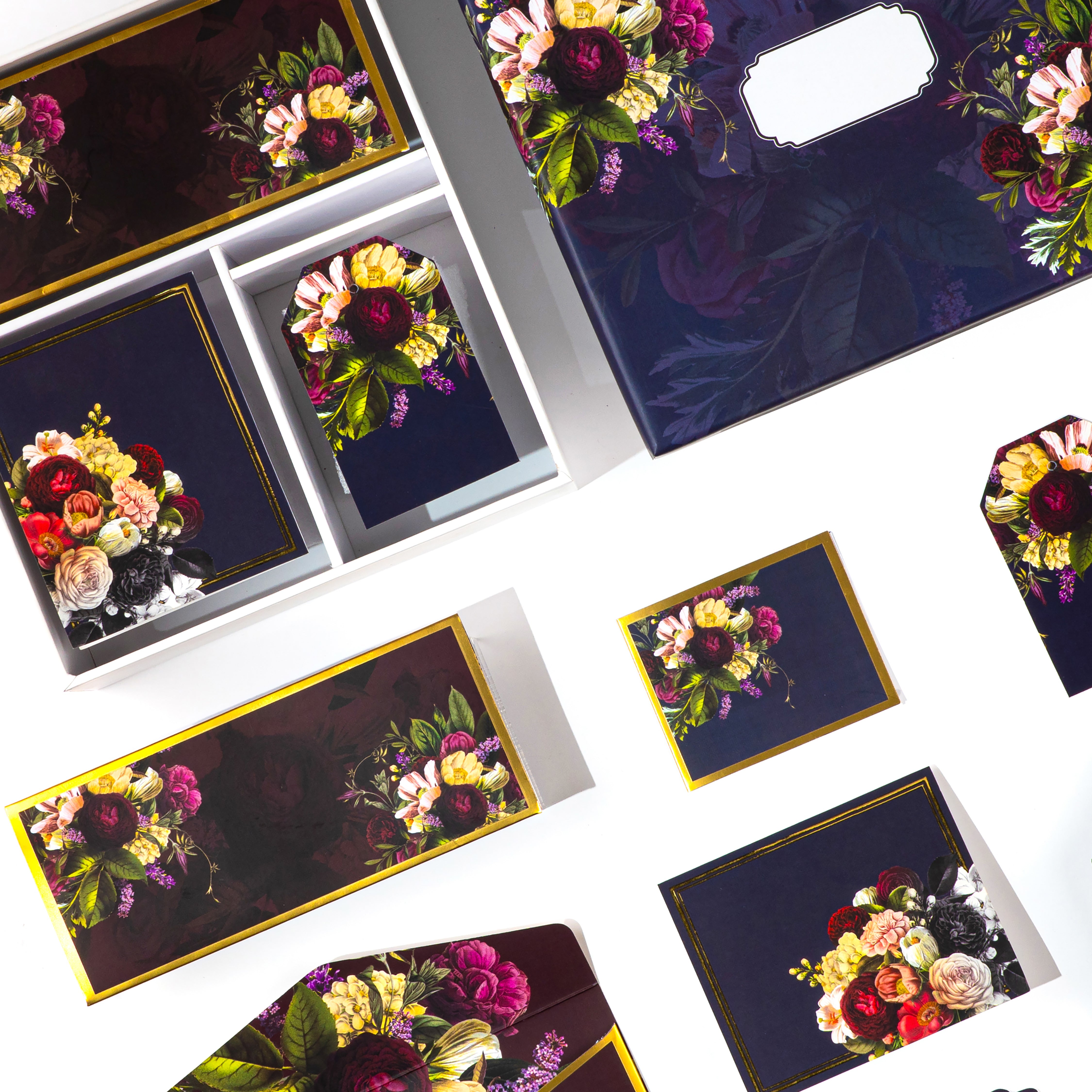 Premium floral stationery gift set in deep tones with rose bouquet prints, ideal for luxury gifting needs.