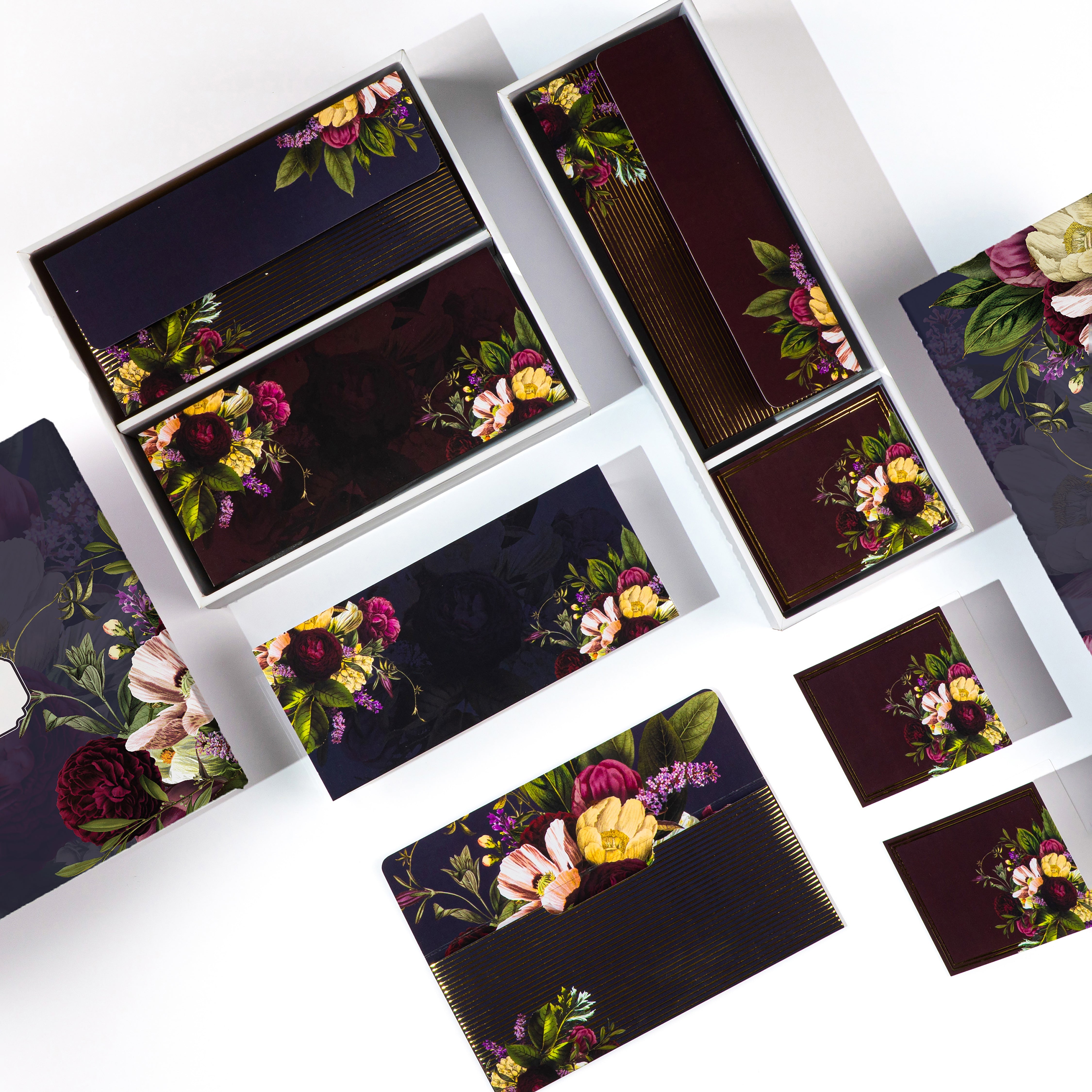 Premium floral stationery gift set in deep tones with rose bouquet prints, ideal for luxury gifting needs.