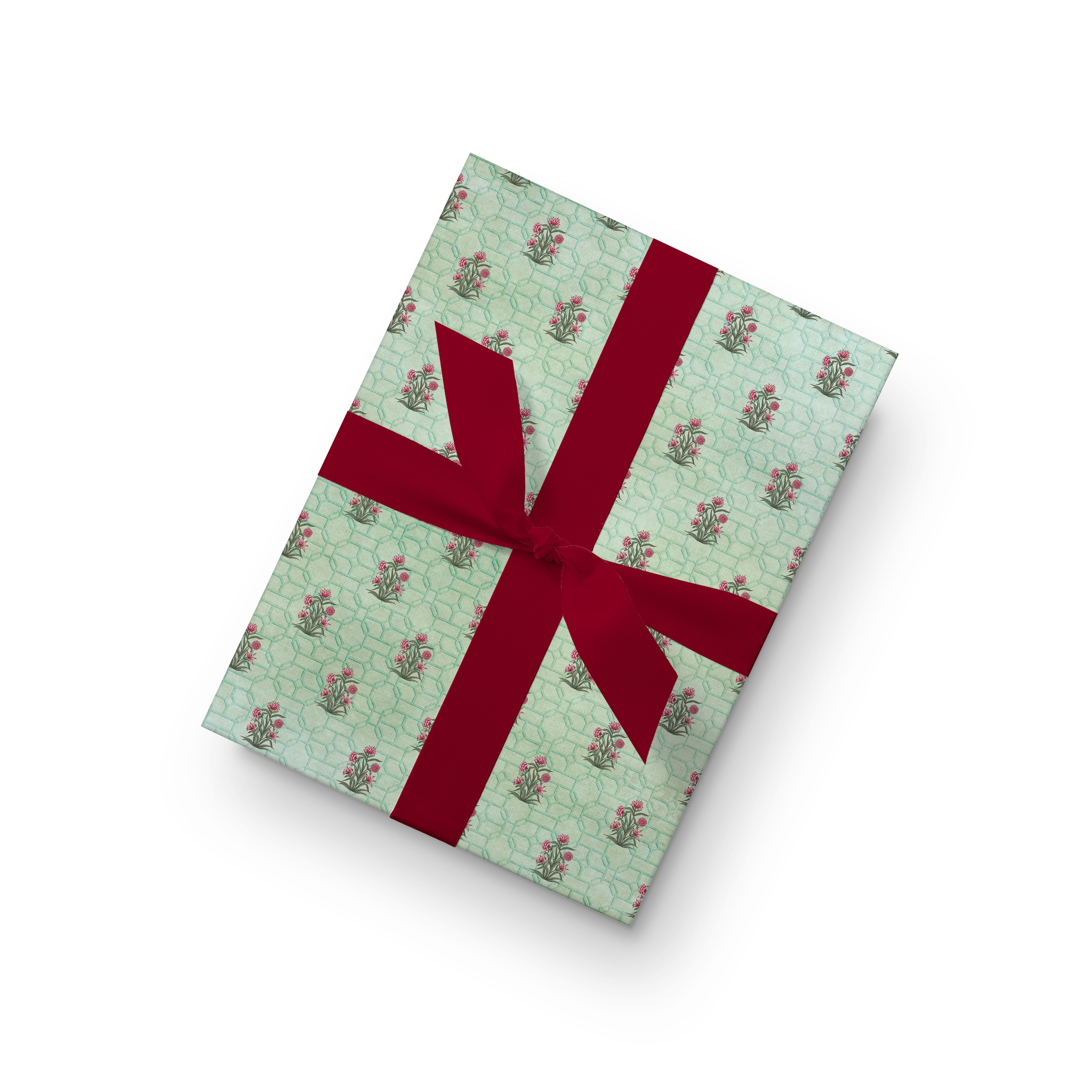 Gift wrap featuring small pink flower bouquets on a light green geometric patterned background.