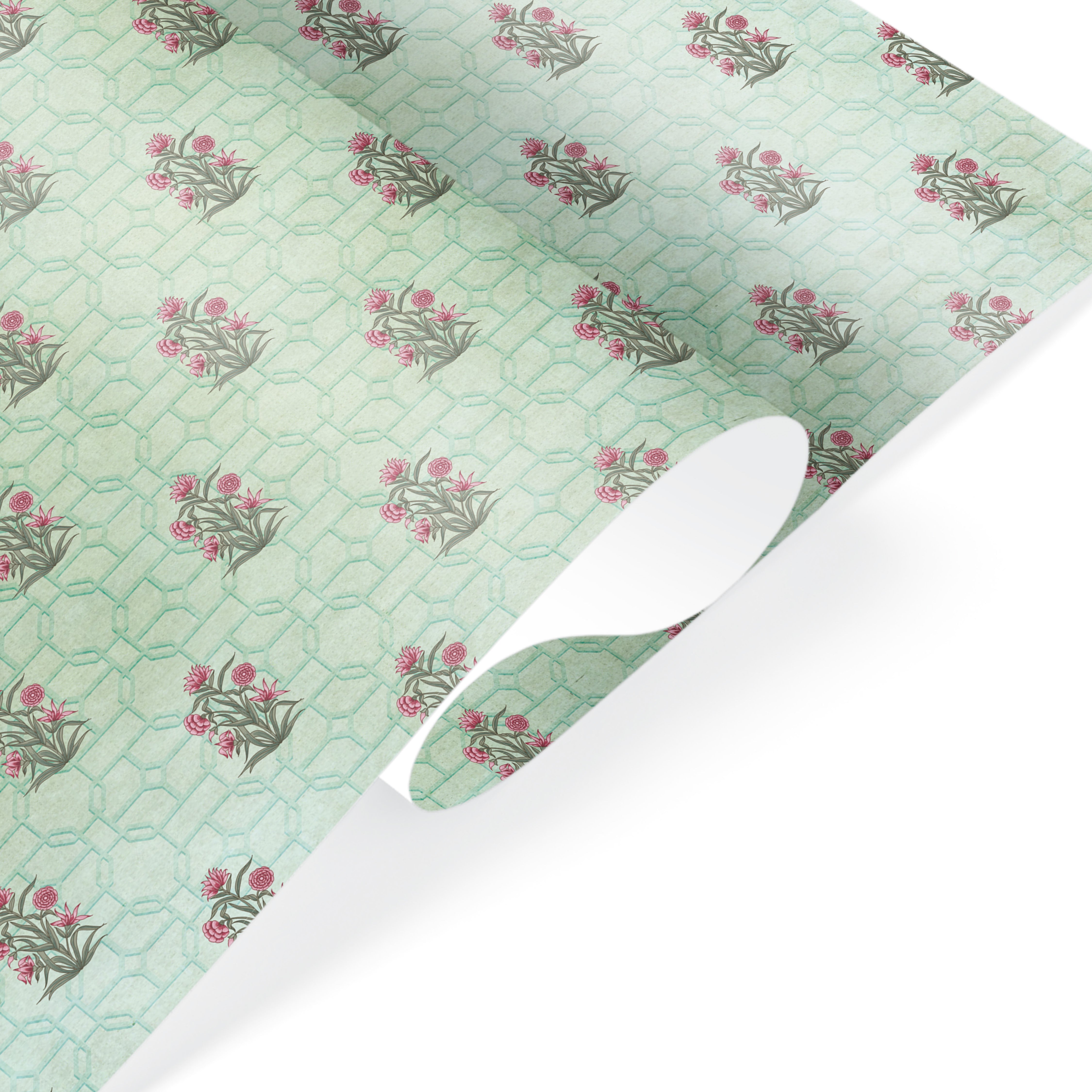 Gift wrap featuring small pink flower bouquets on a light green geometric patterned background.