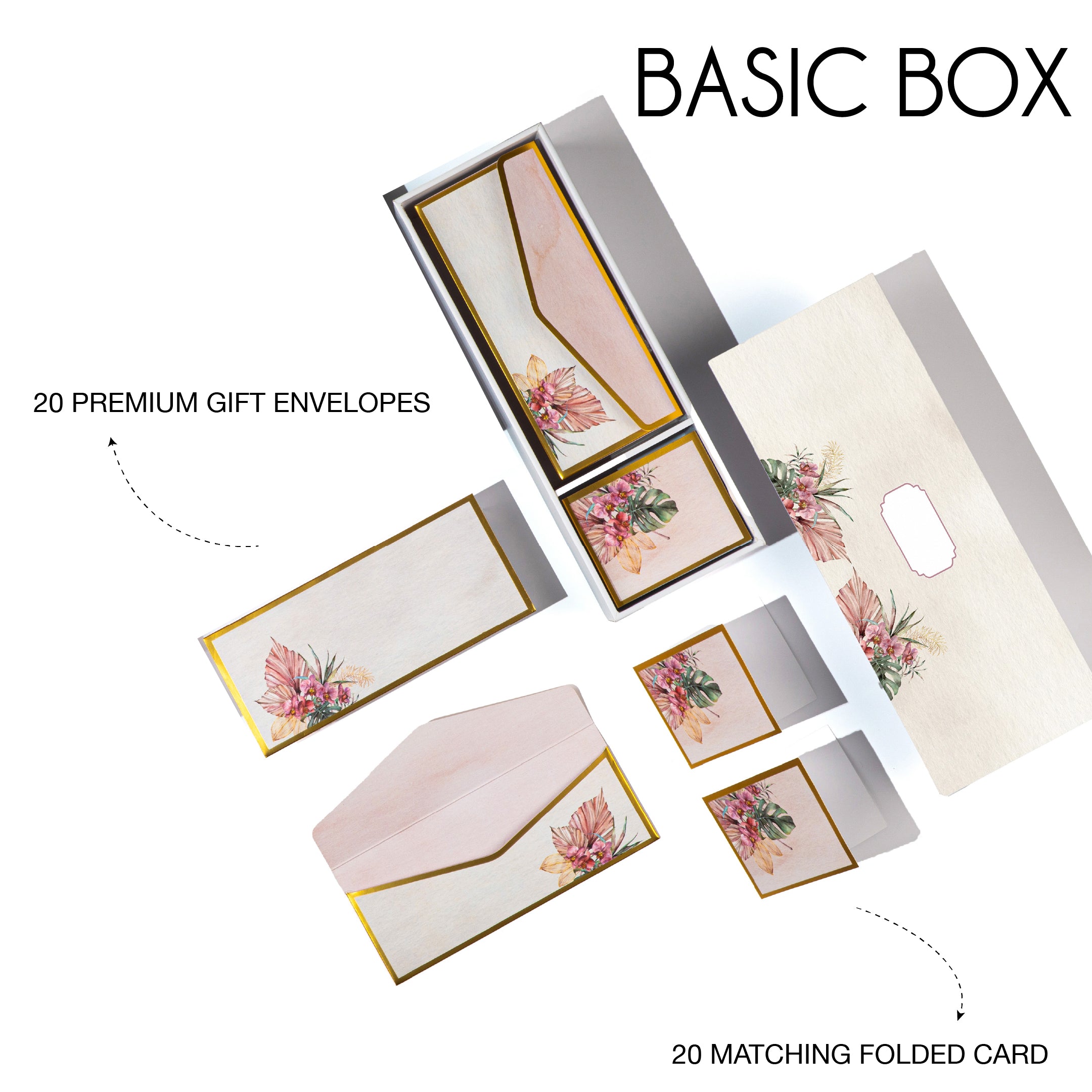 Tropical floral stationery set with gold accents, featuring tags, cards, and envelopes in a wooden-look box.