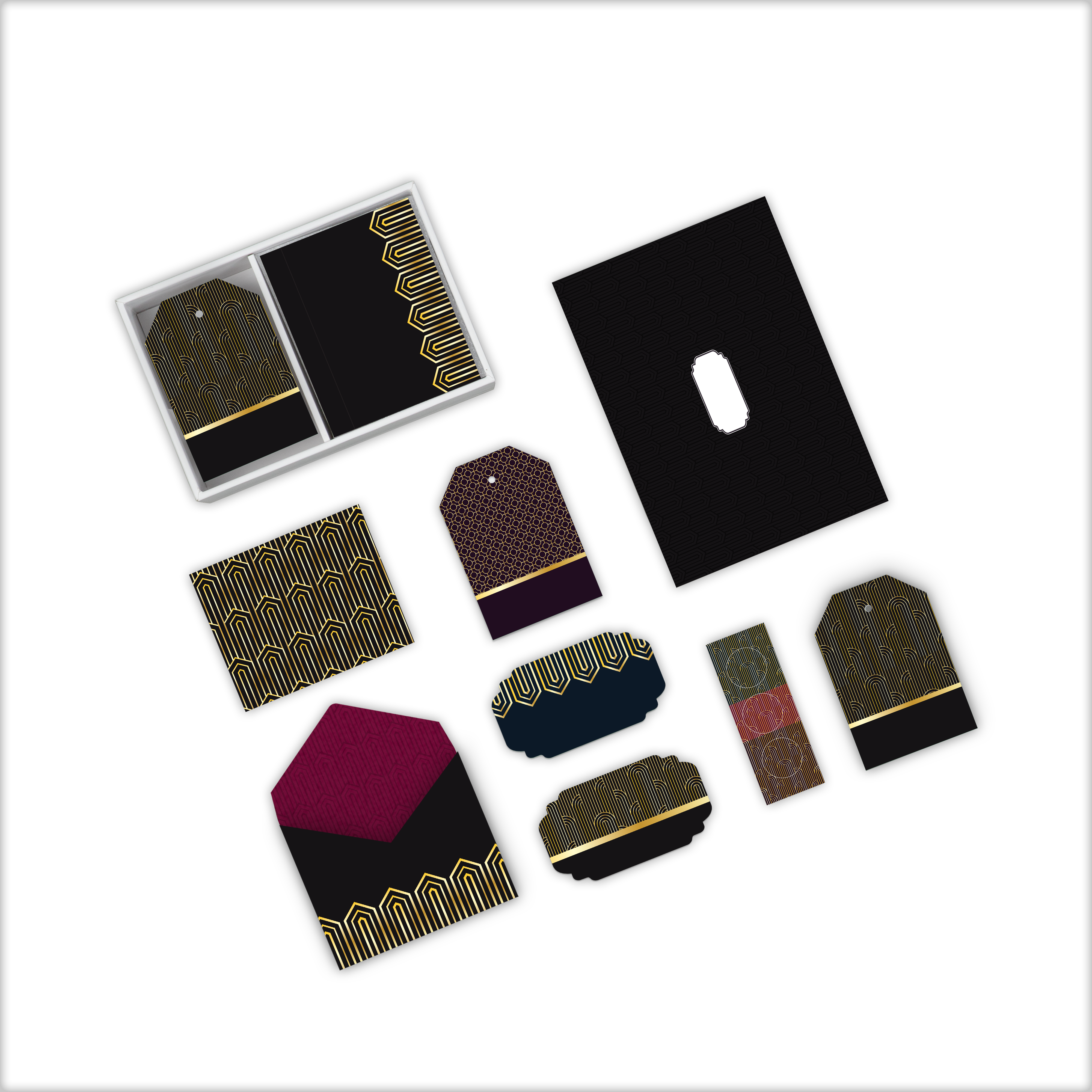 Black and gold Art Deco luxury stationery set with geometric patterns, envelopes, tags, inserts, and gift accessories.