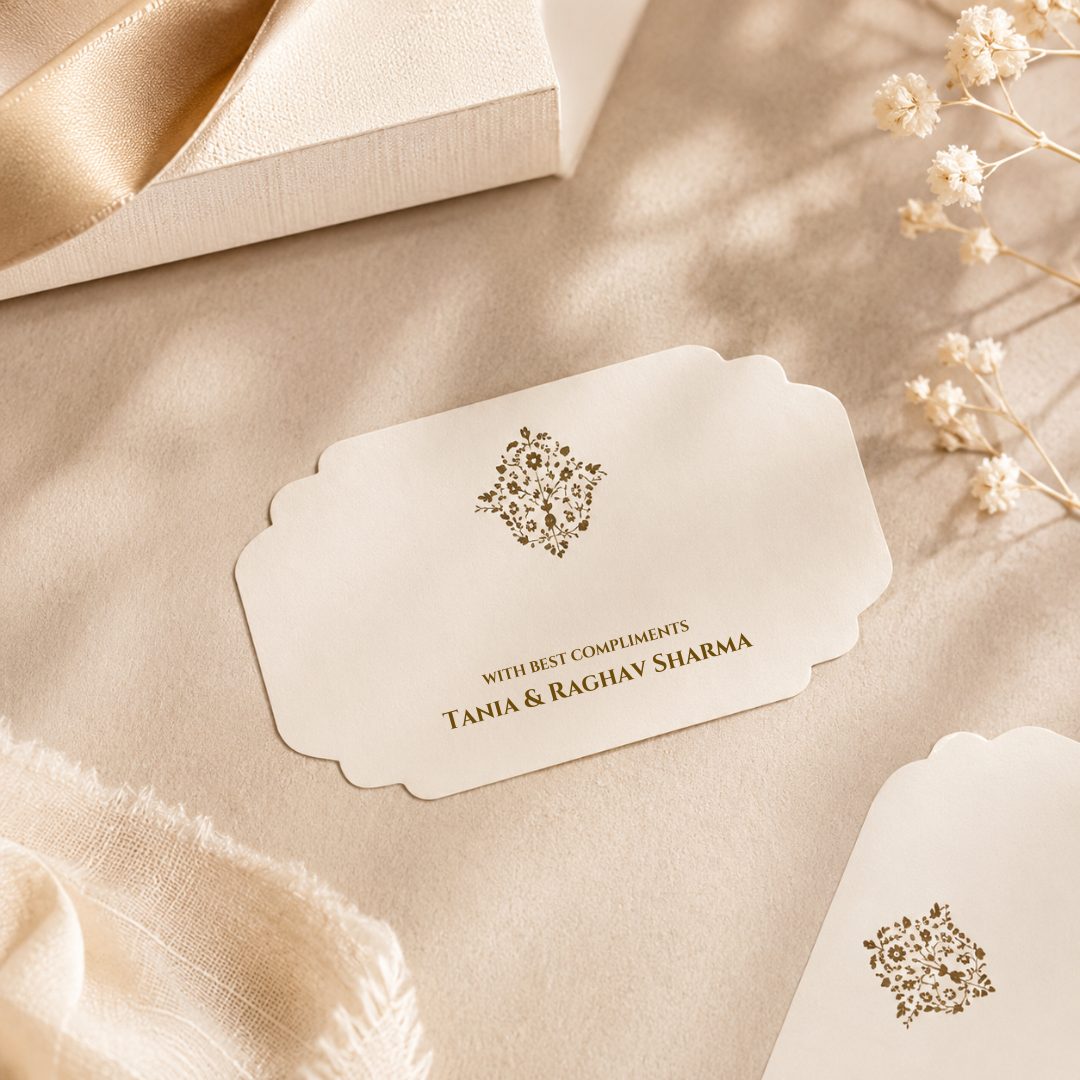 Elegant ivory sticker tag with minimalist botanical accents, designed to add a soft luxurious charm to gift boxes, hampers, and festive favors.