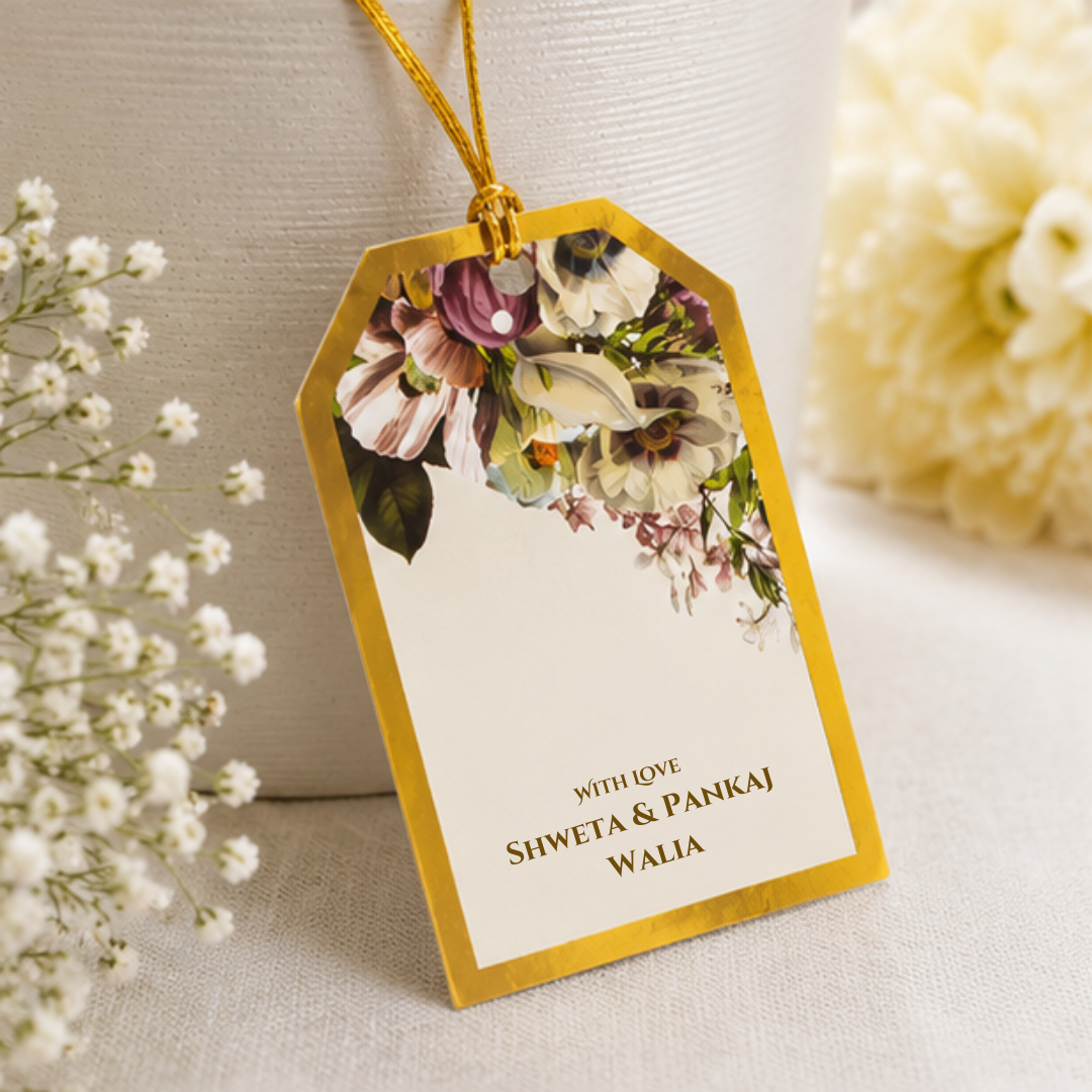 Elegant floral hanging gift tag with rich botanical artwork, gold border detailing, and luxurious golden dori for premium gifting.