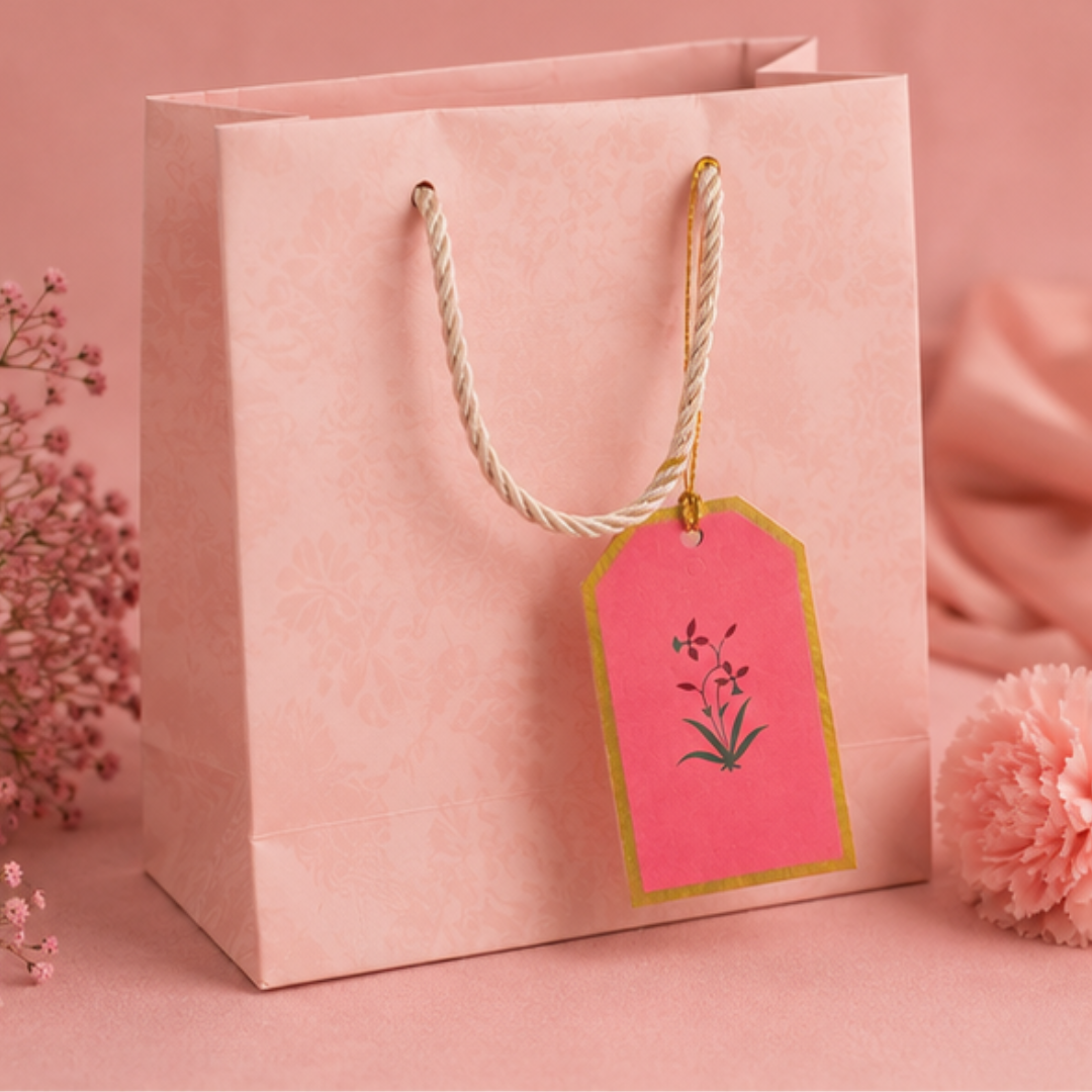 Sophisticated floral hanging tags displayed with a blush pink gift bag and matching backgrounds for premium gifting inspiration.