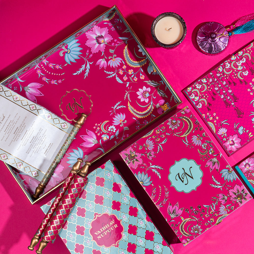 Custom festive gifting suite with floral artwork and handcrafted presentation