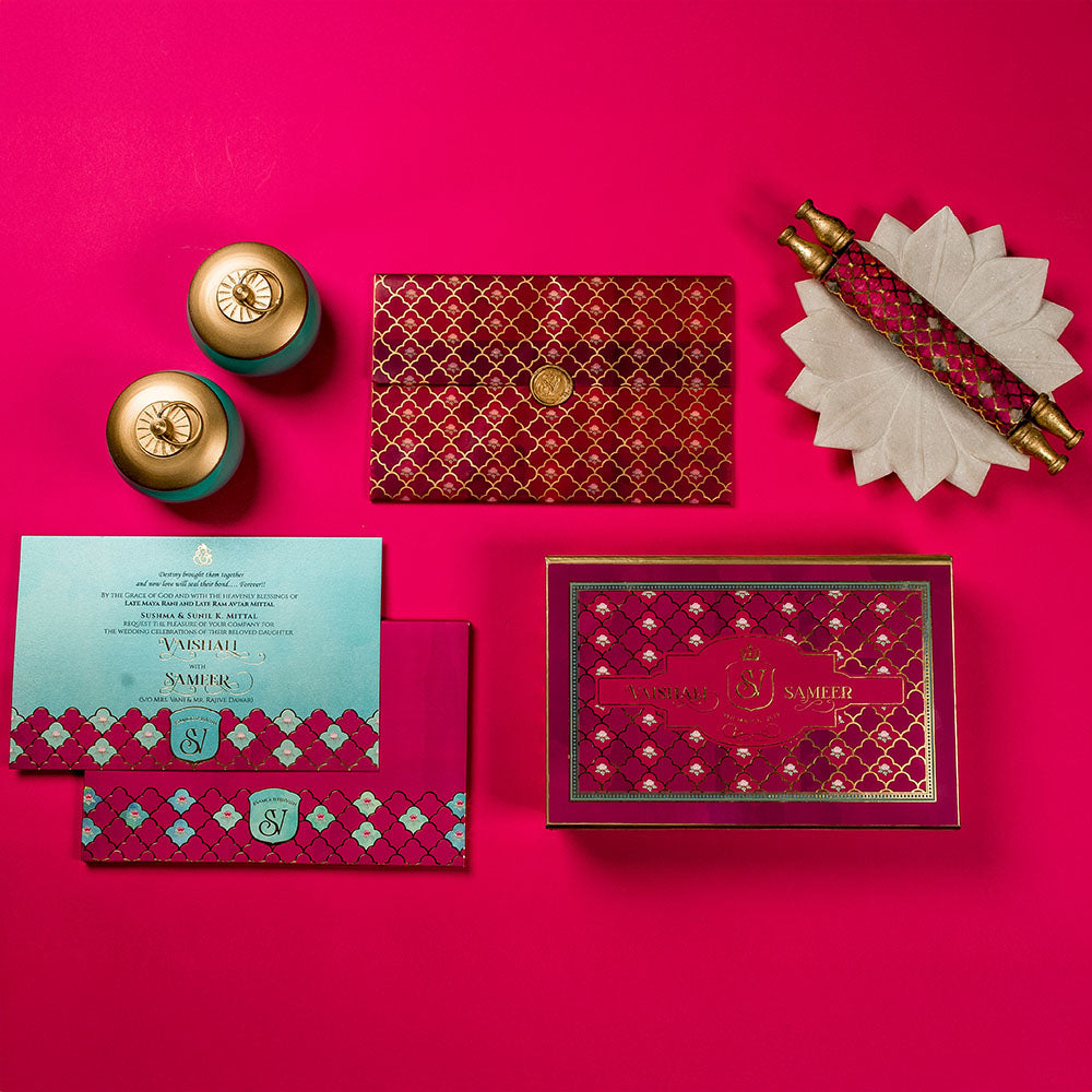 Mughal-inspired wedding card featuring traditional jaali patterns and scroll invite
