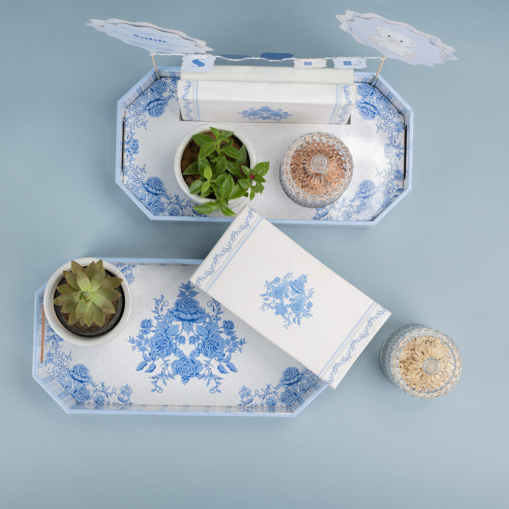 Elegant baby boy announcement tray with sweets, plant, and blue floral Victorian design.