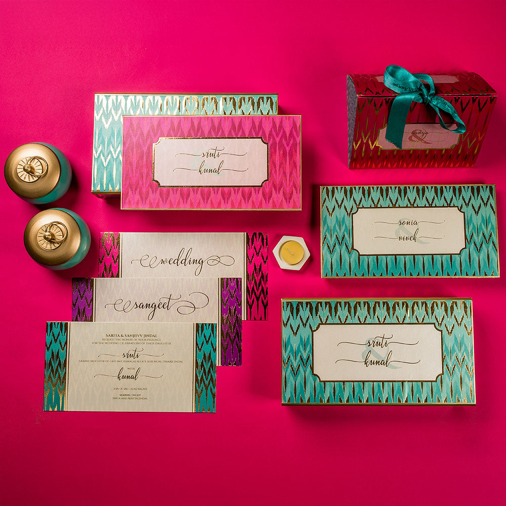 Vibrant ikat wedding invitation suite with bold festive patterns