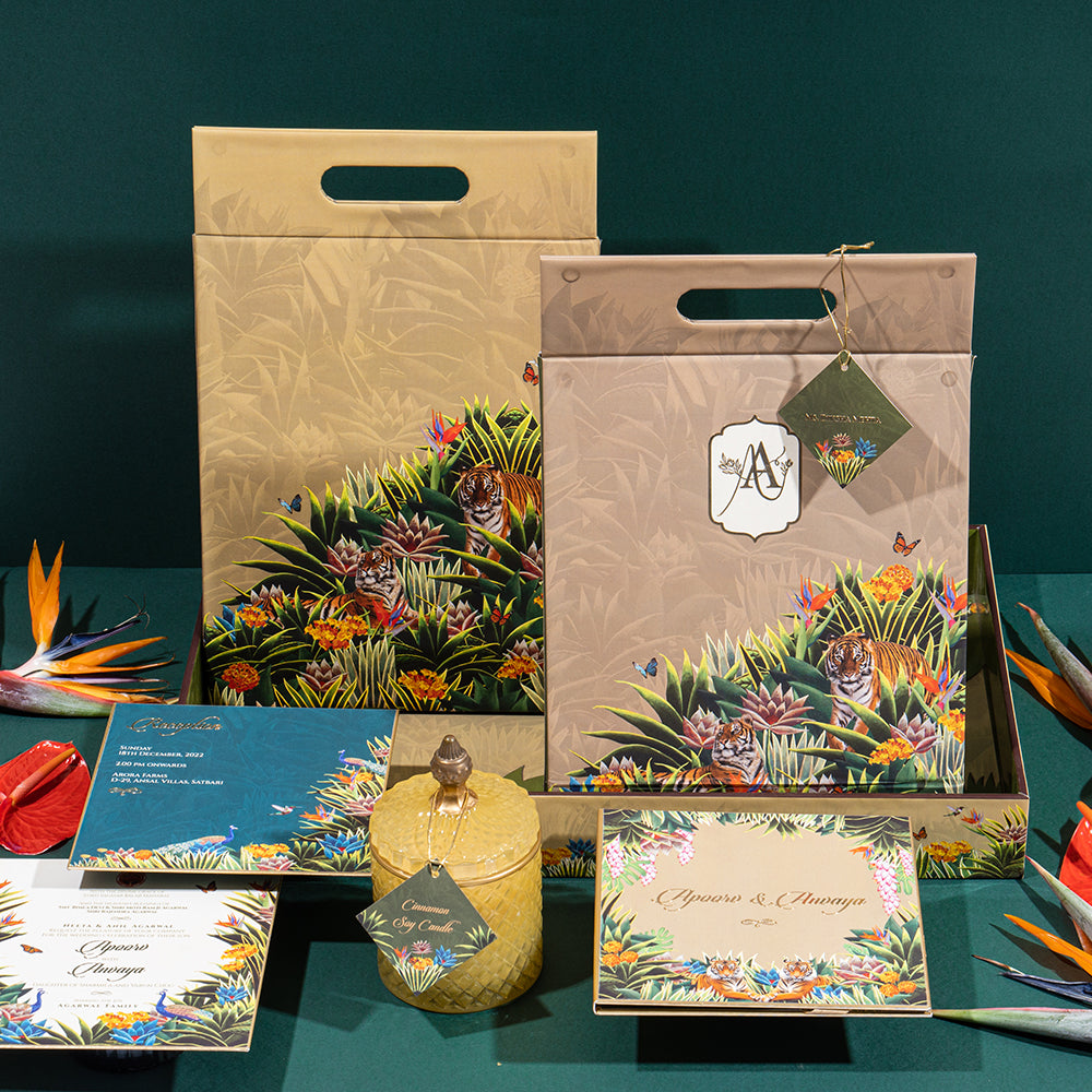 Jungle-themed invitation box with tiger illustrations and bold botanical design