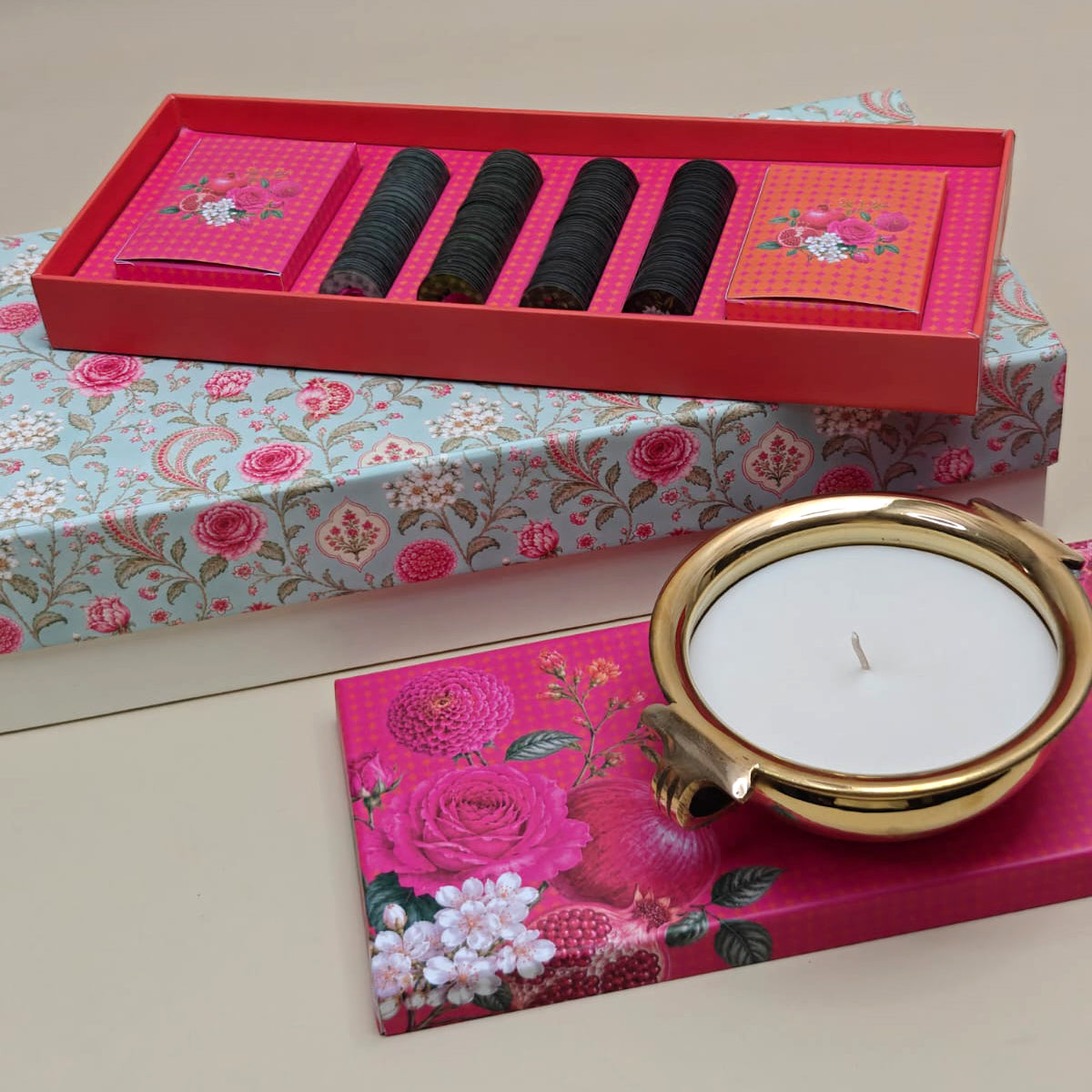 Luxury festive gift box featuring playing cards, poker chips and Mogra candles