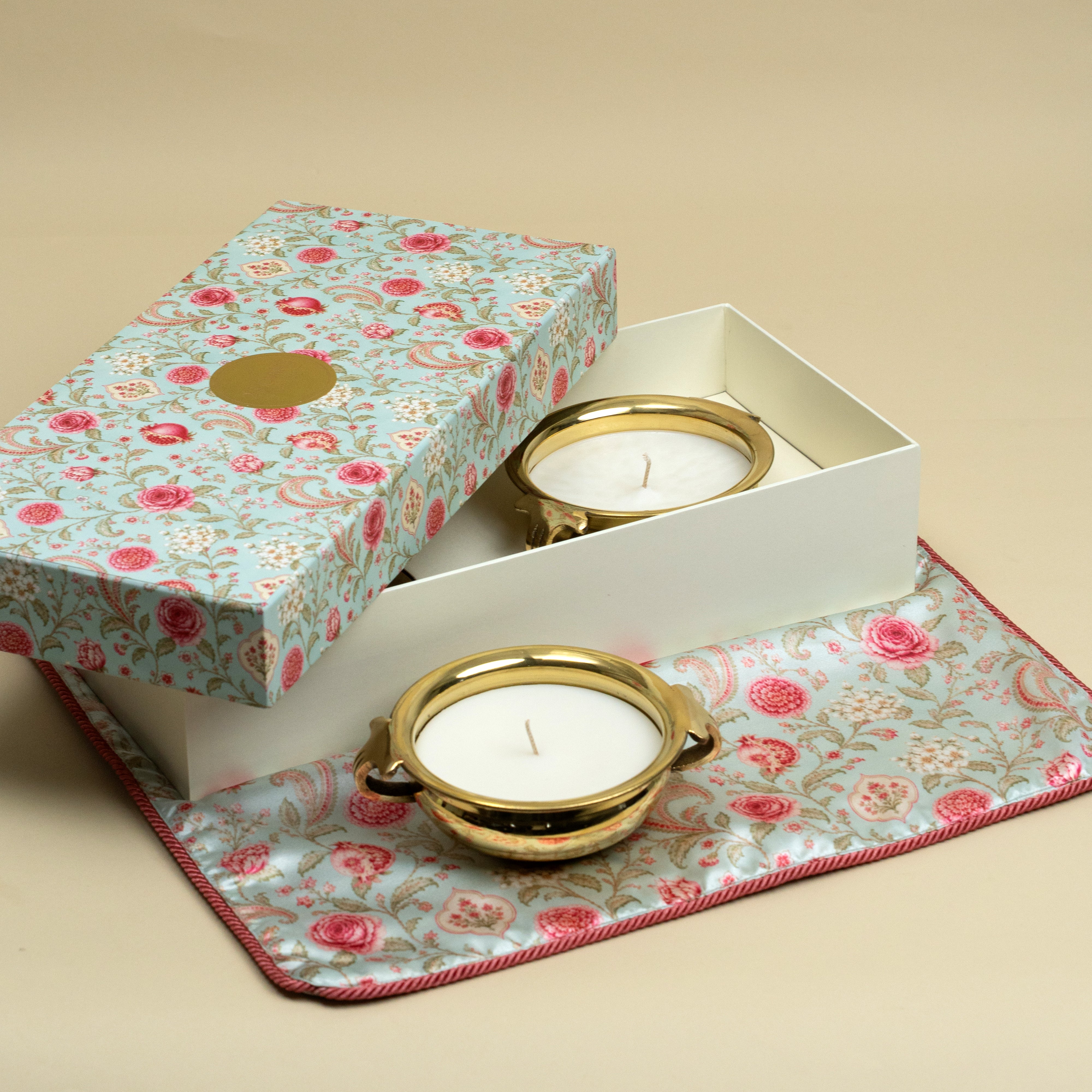 Set of two brass urli candles in premium floral gift box