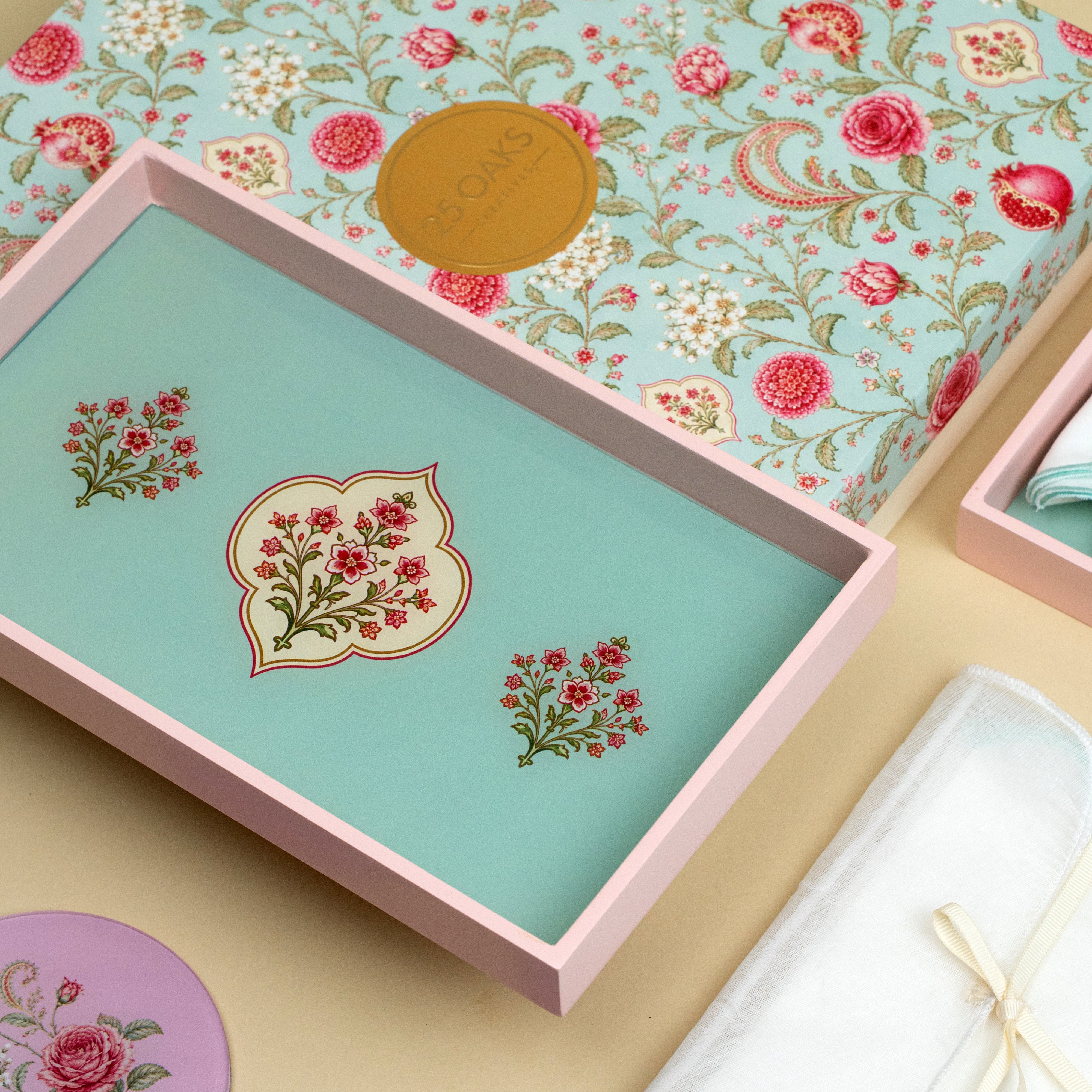 Floral home entertaining gift set featuring serving trays, napkins and matching coasters
