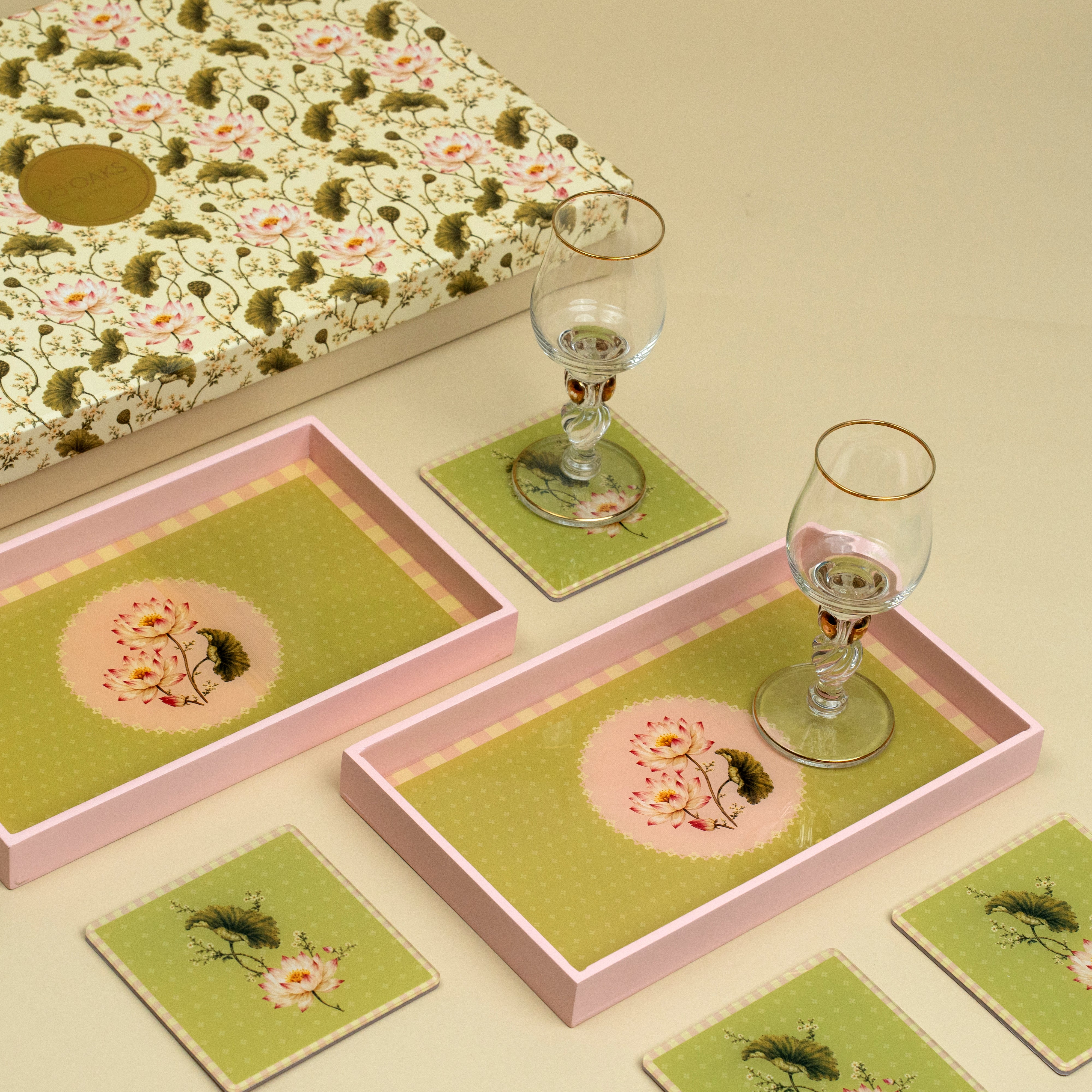 Green and pink floral serving trays with matching coasters in a premium gift box