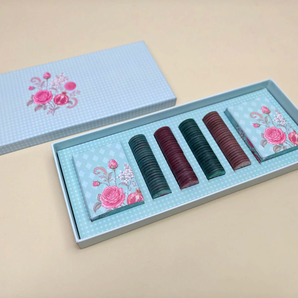 Festive corporate gift box with playing cards and 100 poker chips