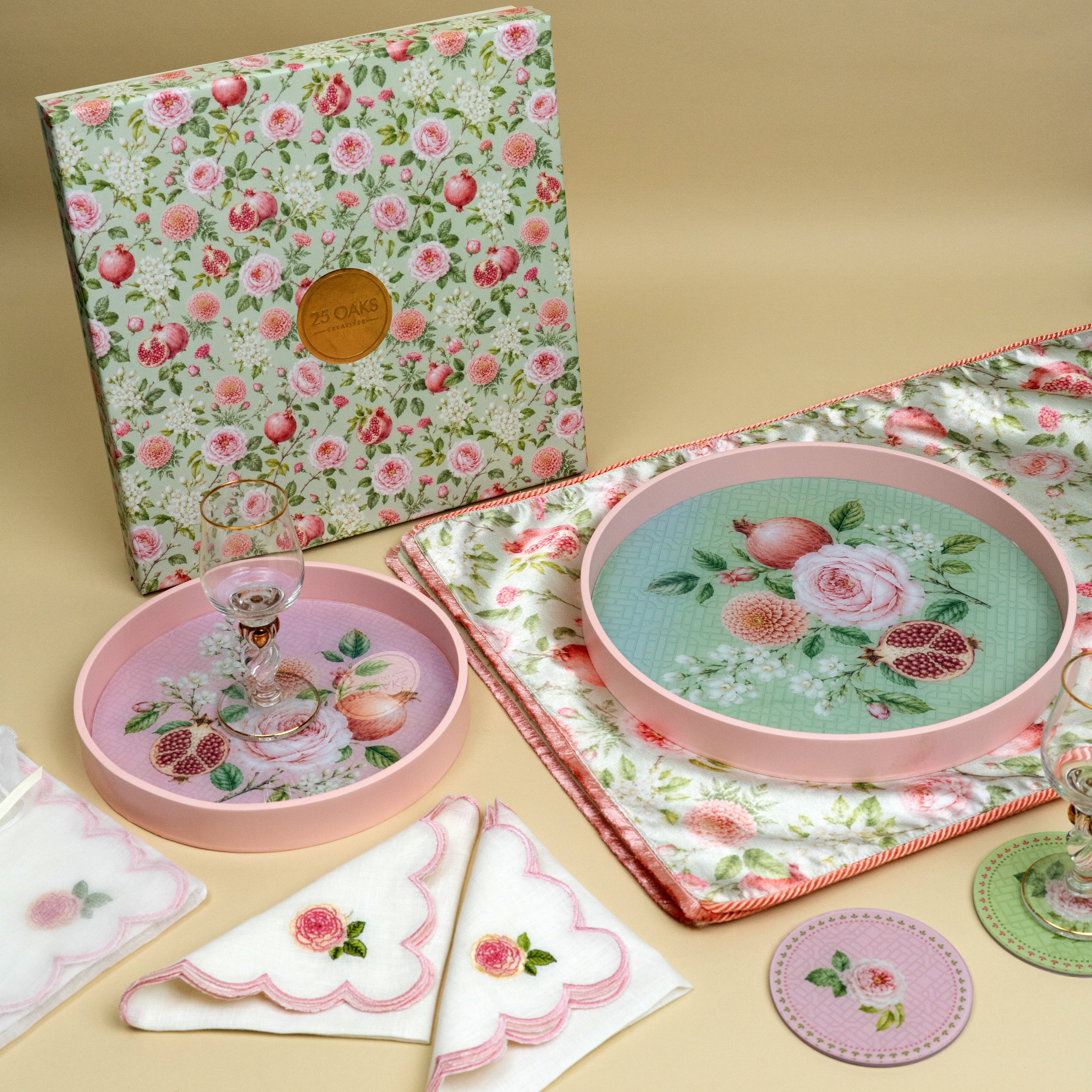 The Sundowner festive gift set with floral round trays, cocktail napkins and coasters