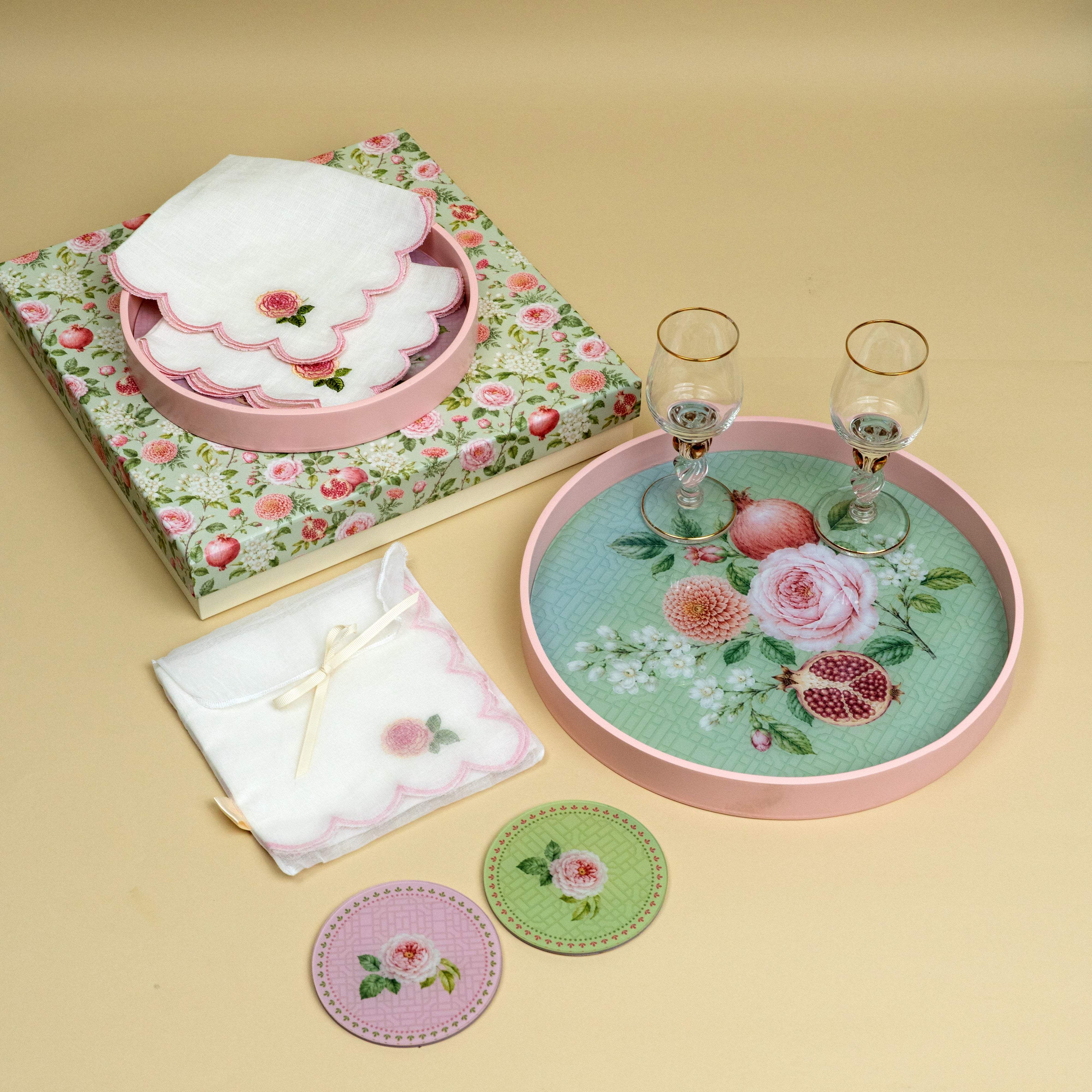 Floral festive entertaining set with round trays, embroidered cocktail napkins and coasters