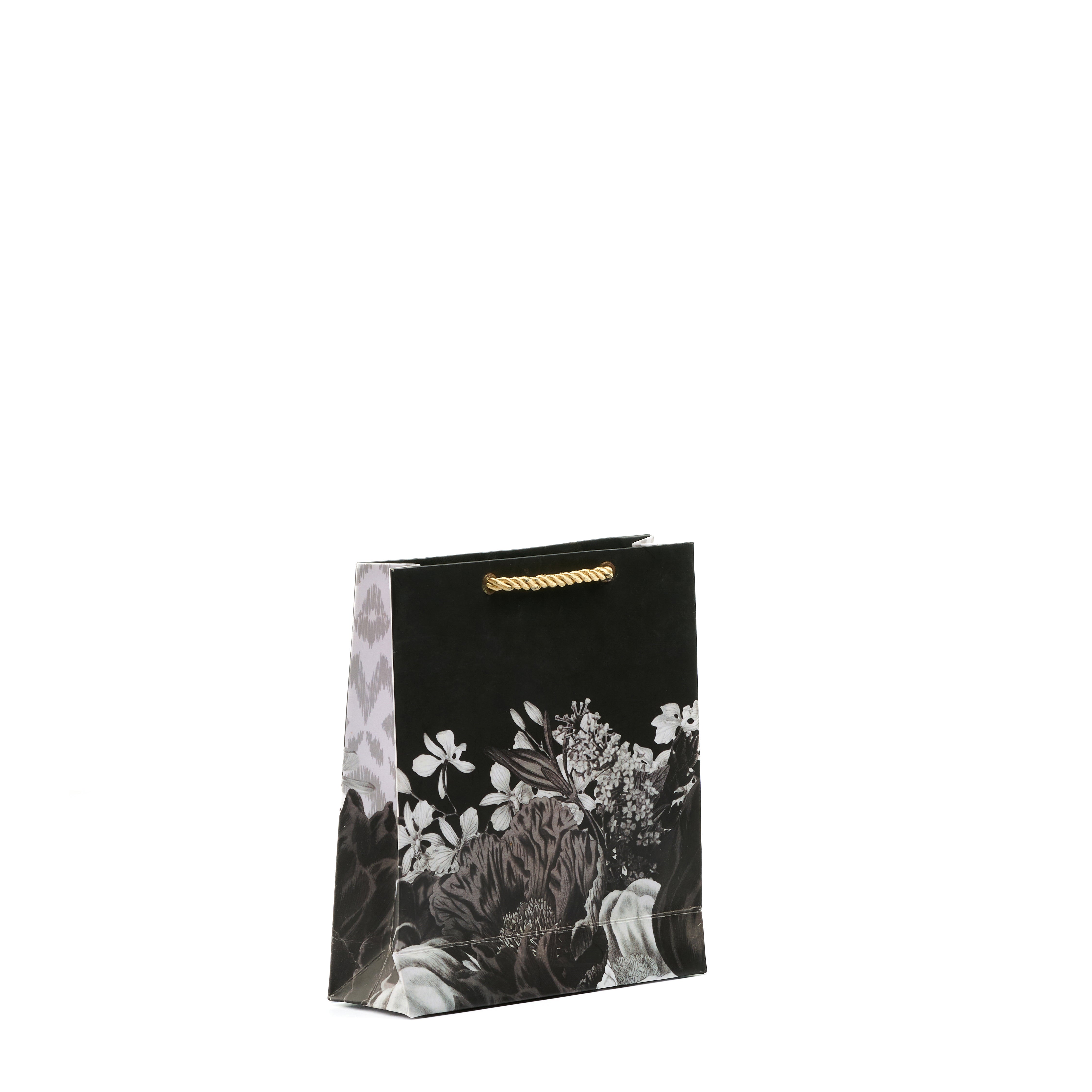 Small black floral gift bag with detailed white blooms and ikat sides, perfect for premium favors and trinkets.