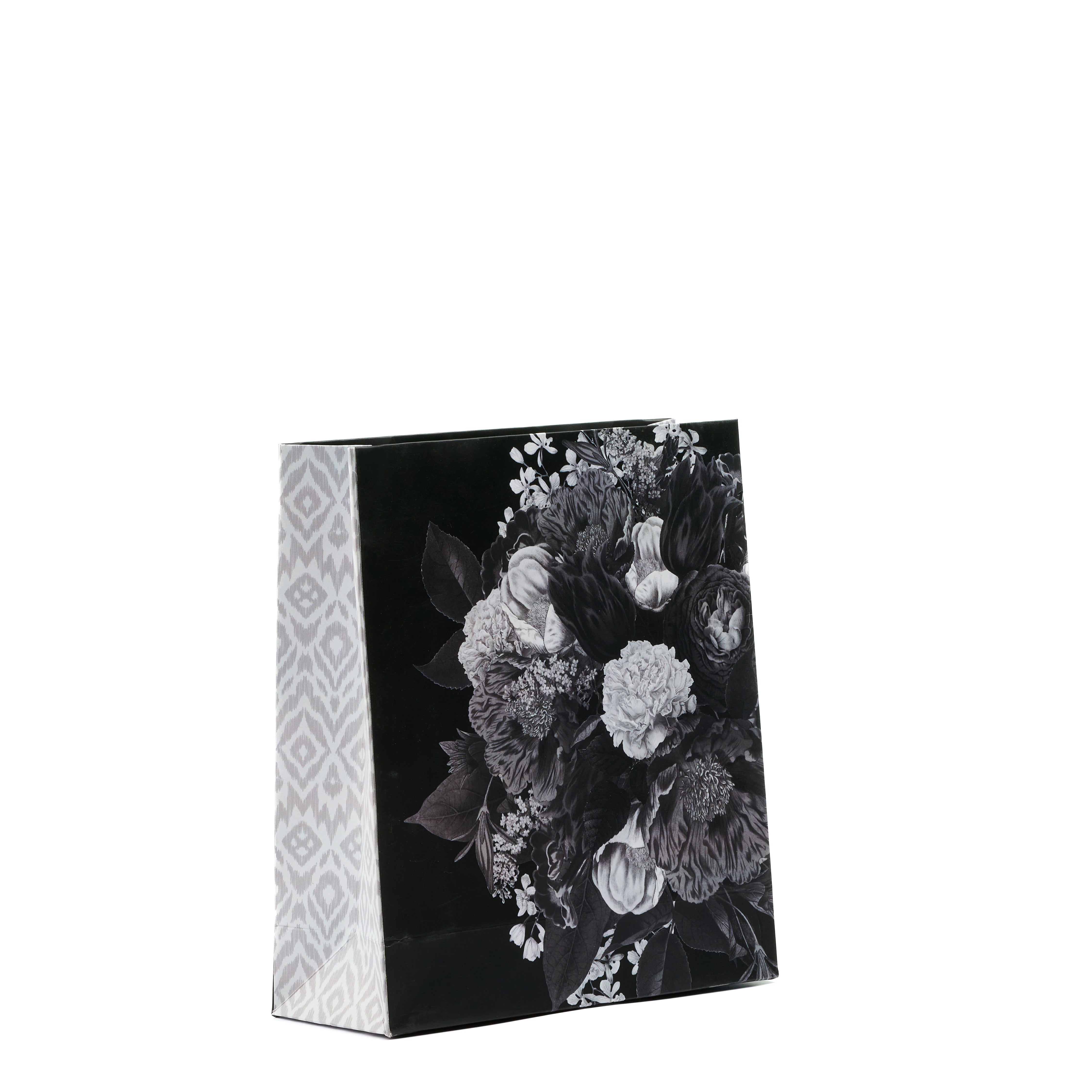 Monochrome floral medium gift bag with dark blooms and ikat sides, perfect for luxury celebrations and occasions.