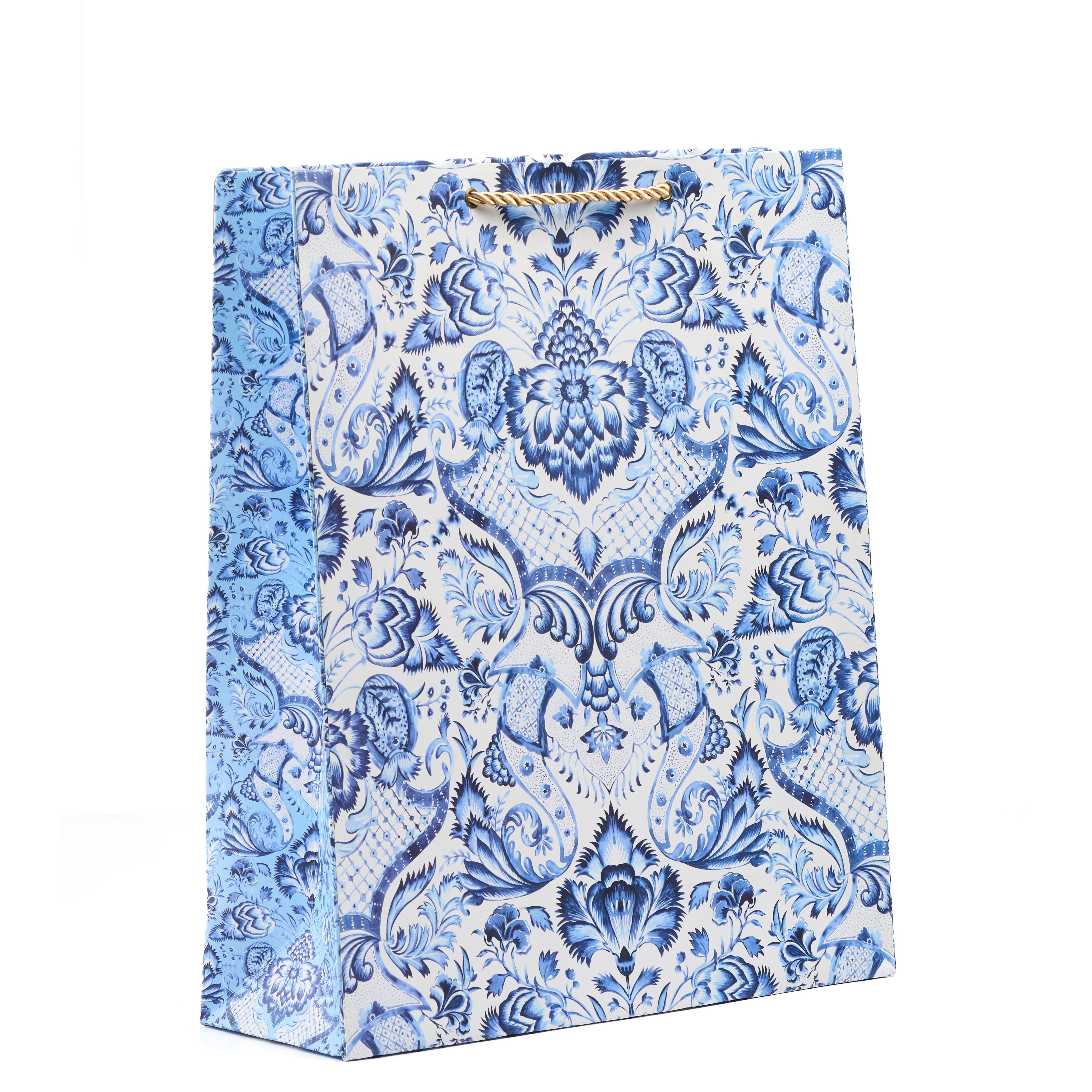 Blue Batik shirt gift bag with intricate floral patterns in blue and white, perfect for formal and festive gifting.