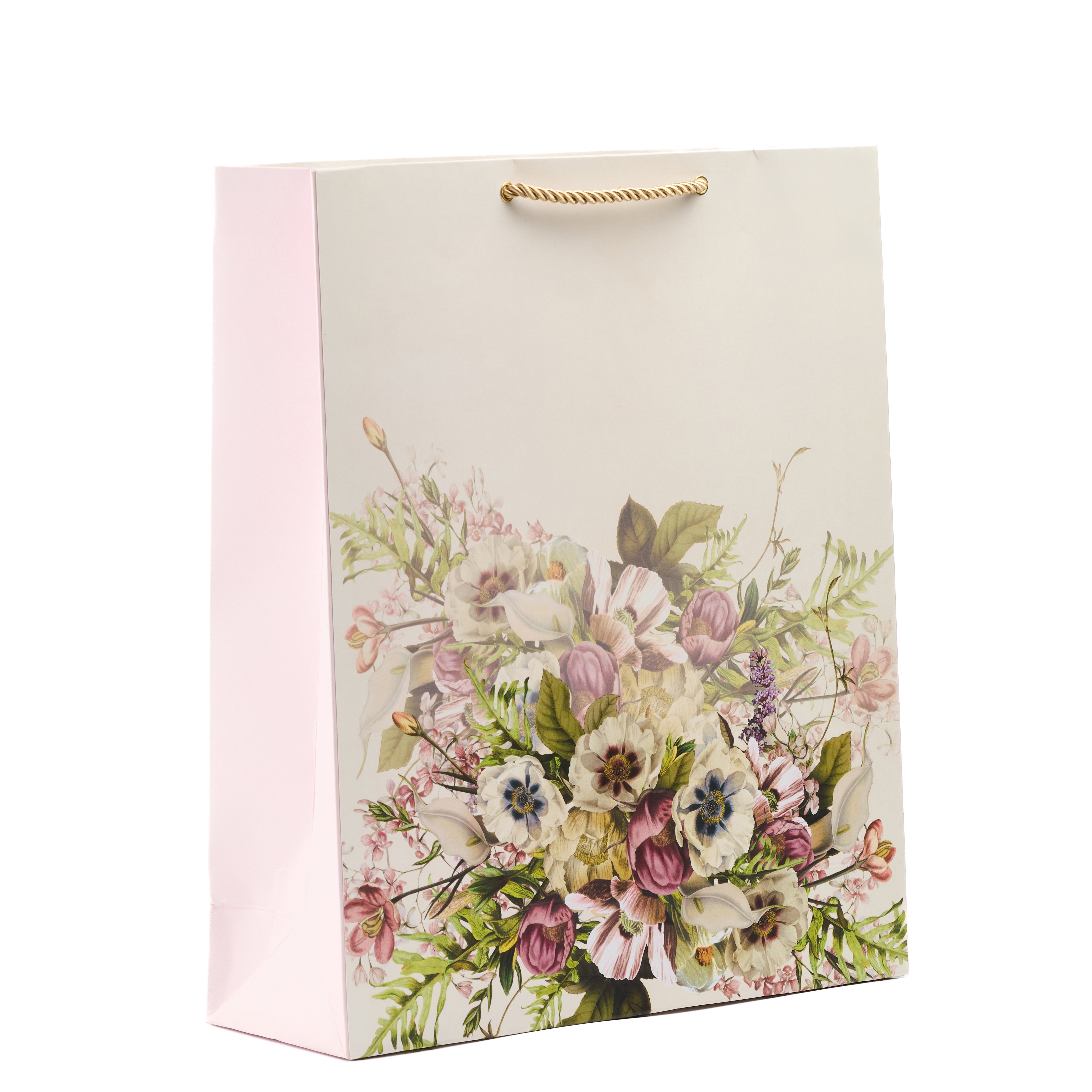 White floral shirt gift bag with watercolor-style pastel bouquet, perfect for elegant and heartfelt gifting.

