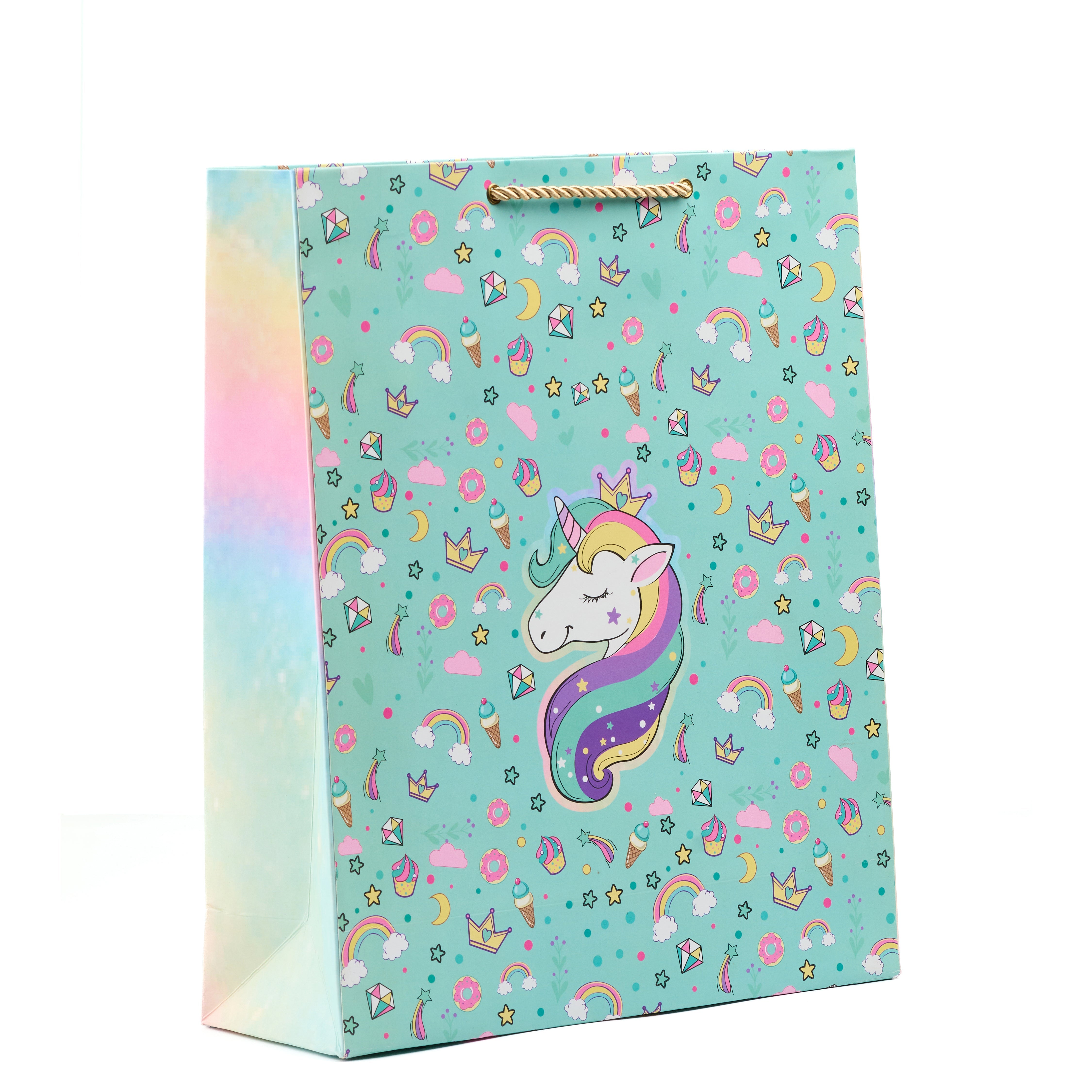 Large mint gift bag with rainbow unicorn and pastel icons – ideal for kids' gifting.

