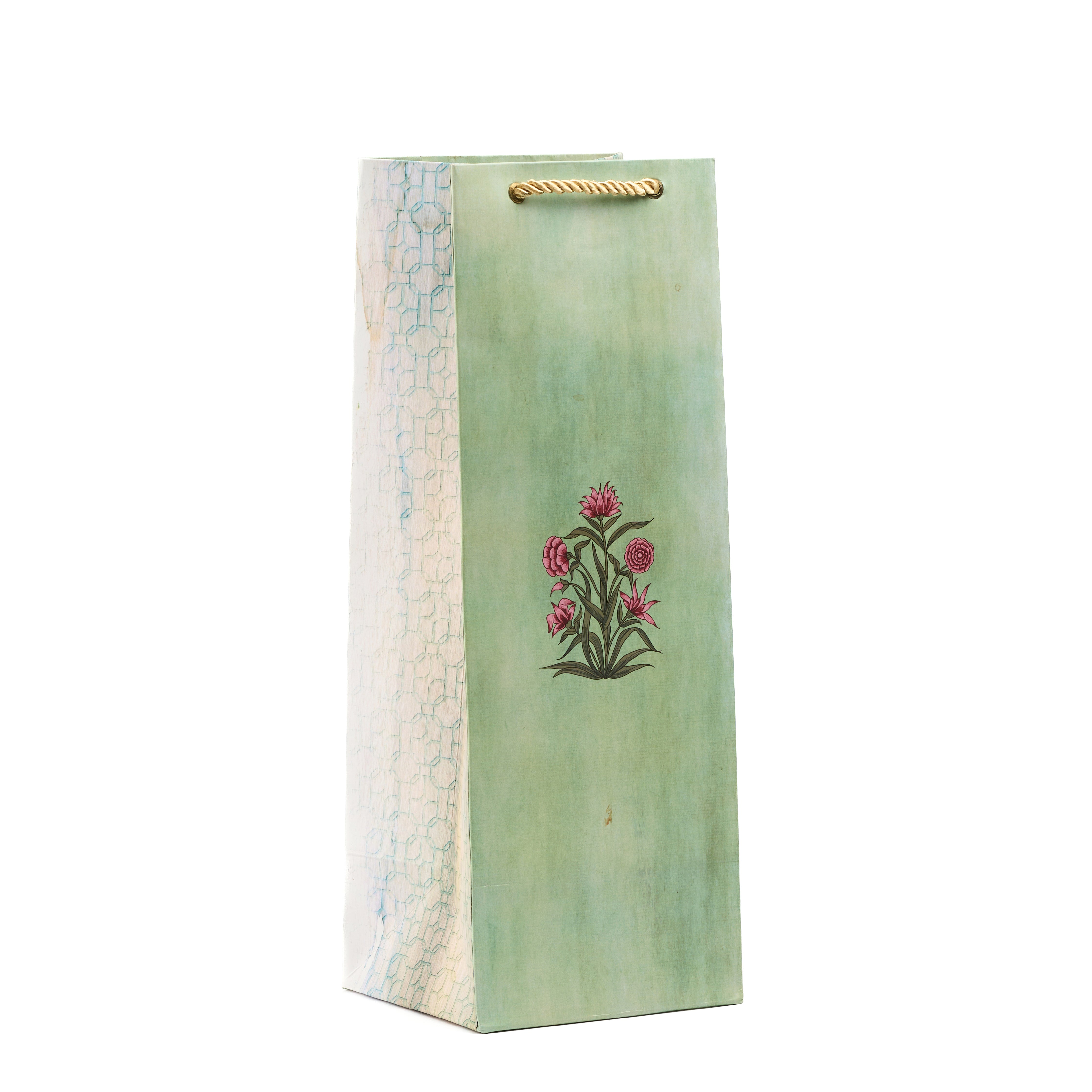 Tall wine gift bag with dark floral artwork and ikat print sides, perfect for classy bottle gifting.