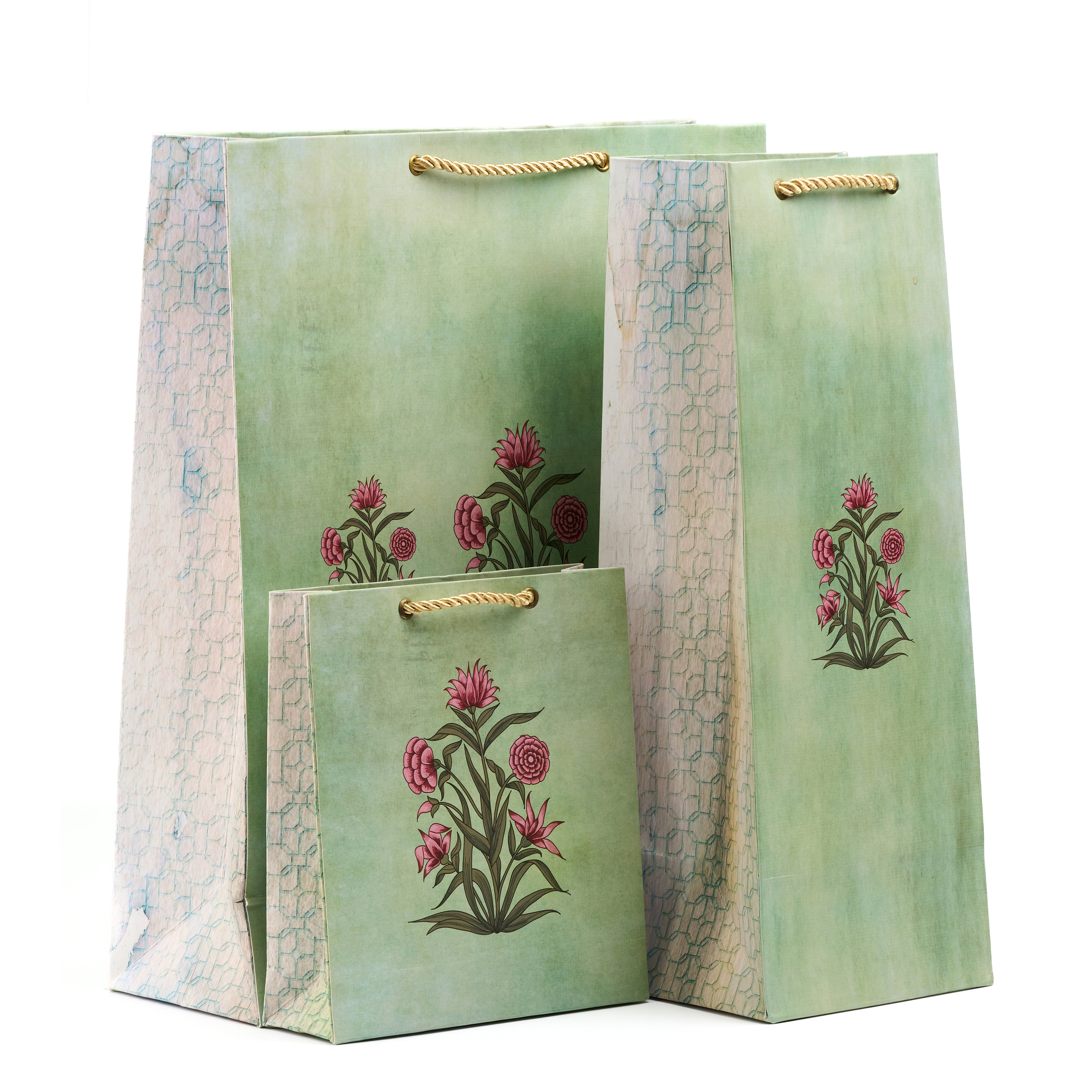 Grande gift bag set with shirt, medium, small, and wine bags in a black floral and ikat design, ideal for luxe gifting.