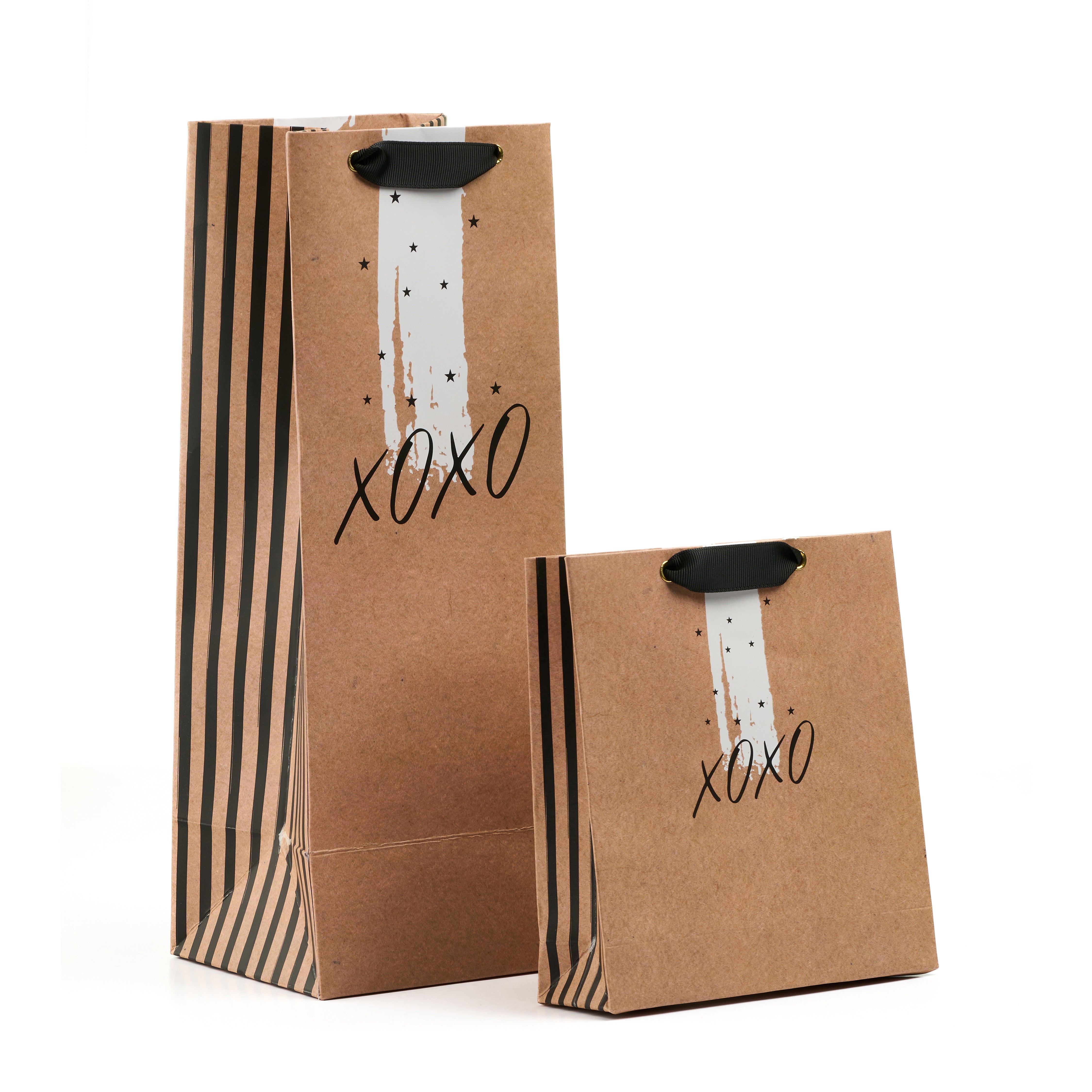 Kraft gift bag with XOXO print, striped sides, and black ribbon handles, available in wine and perfume sizes.