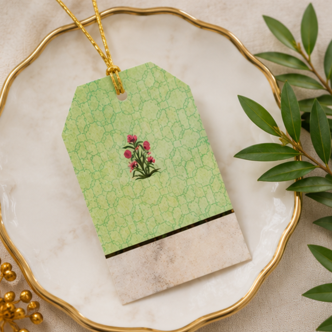 Sophisticated botanical hanging tag featuring soft green lattice patterns, floral detailing, and premium golden string for elegant gifting.