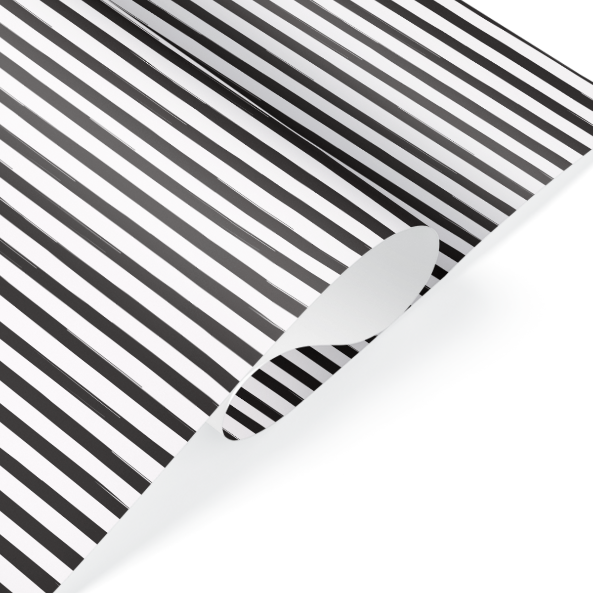 Black and white striped wrapping paper with bold linear pattern for modern gift packaging.