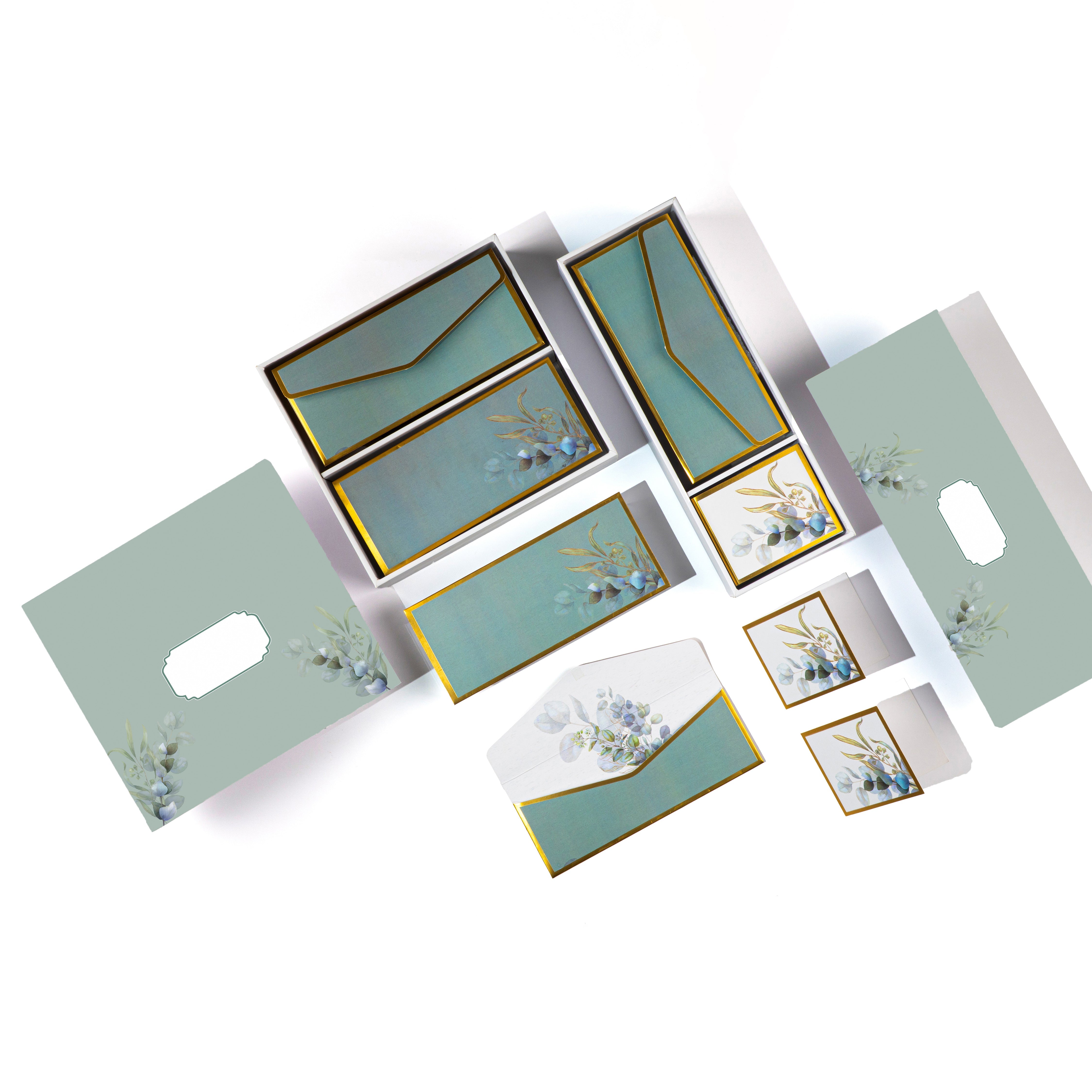 Elegant eucalyptus-themed luxury stationery set with gold borders, perfect for gifting or personal use.