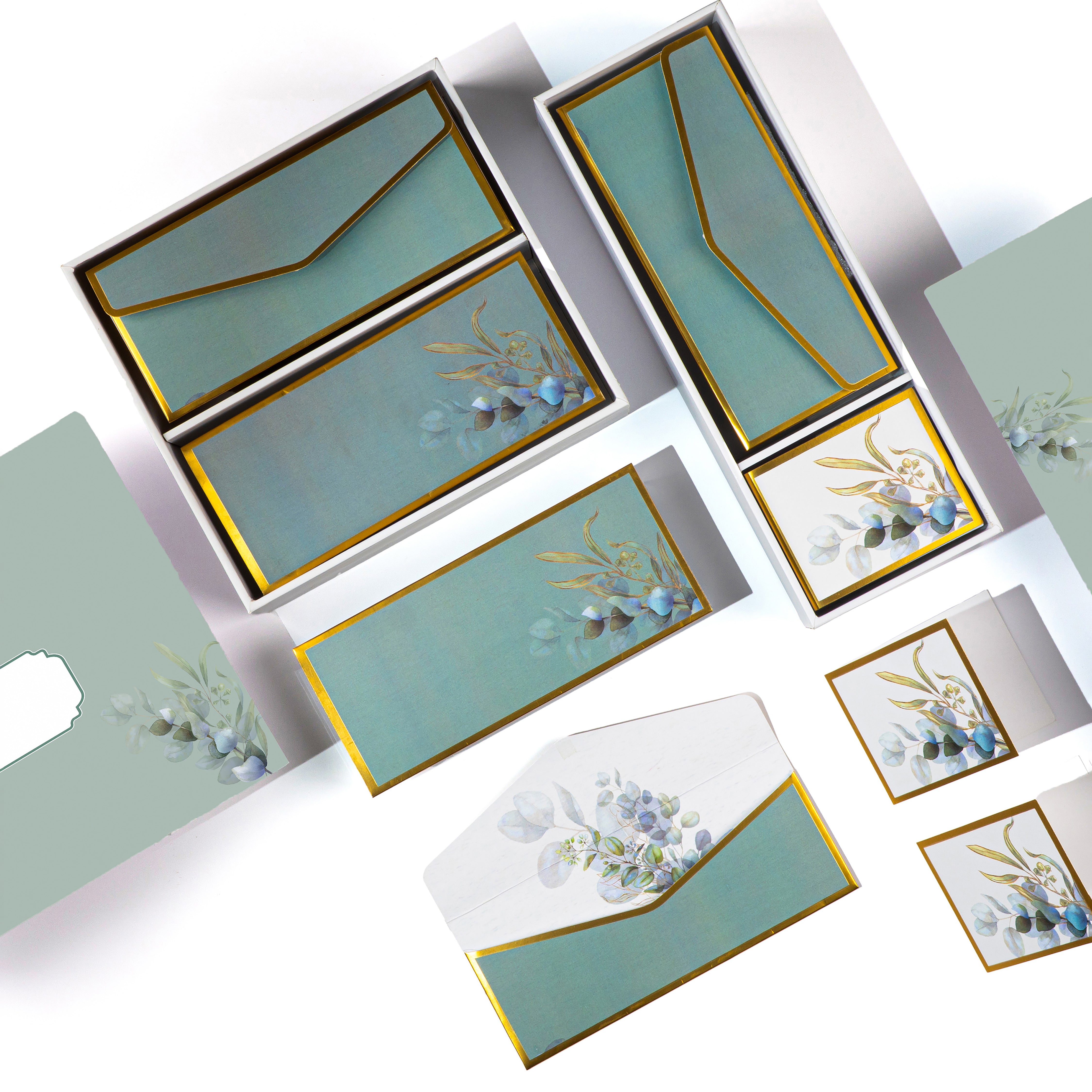 Elegant eucalyptus-themed luxury stationery set with gold borders, perfect for gifting or personal use.