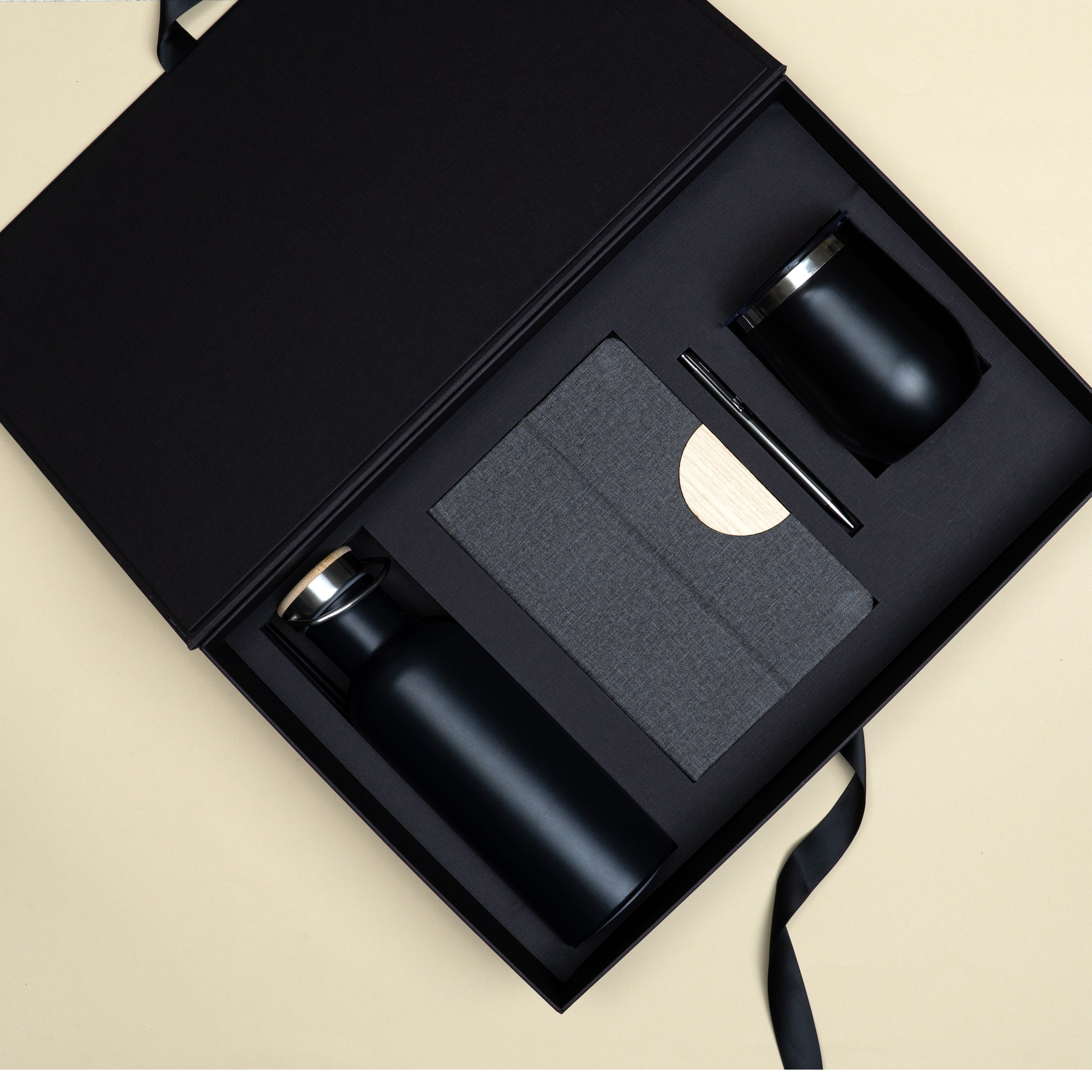 The Journey corporate gift set with 700 ml vacuum flask, black metallic pen, travel mug and diary with phone stand