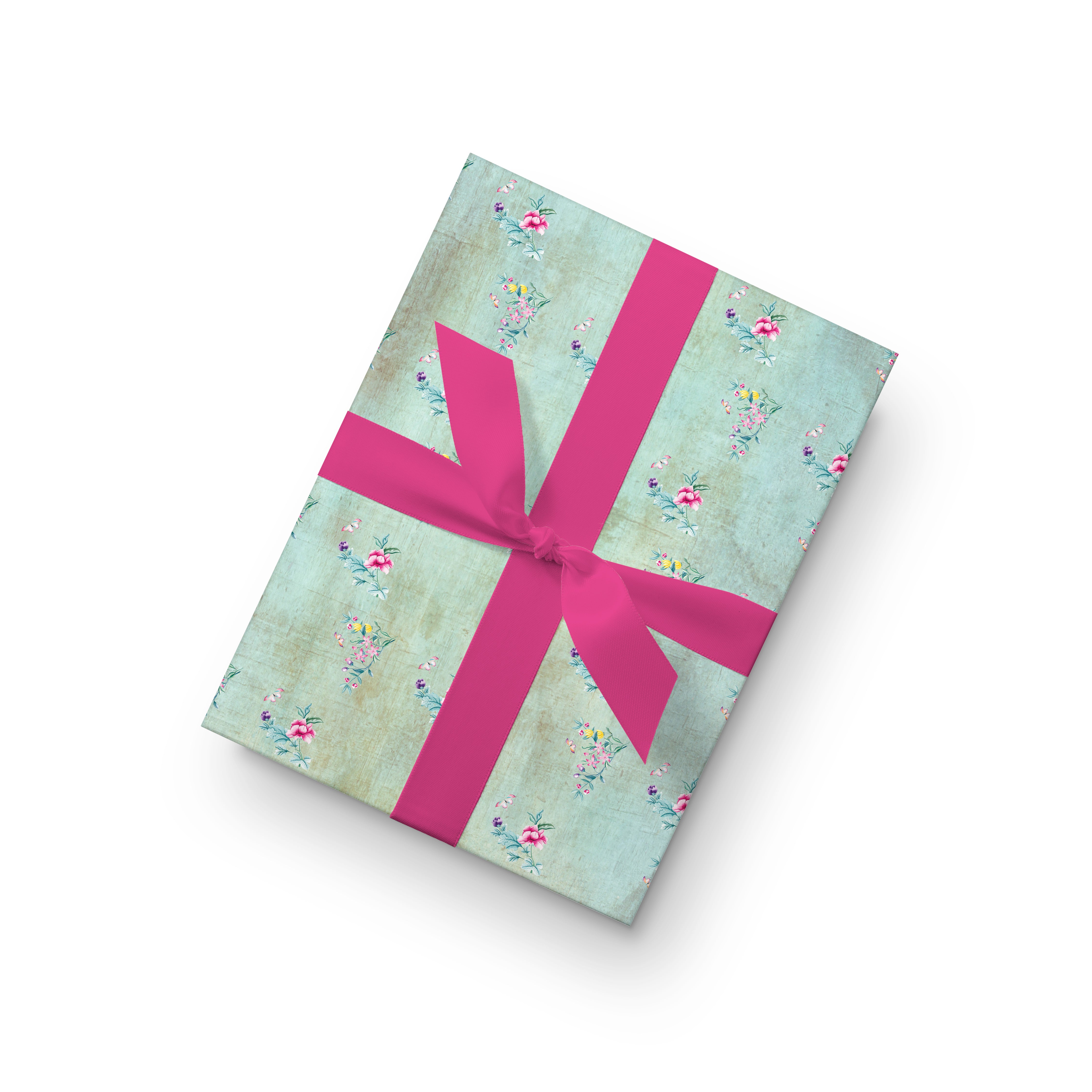 Wrapping paper featuring small, scattered floral patterns with pink, yellow, and purple flowers on a textured background.