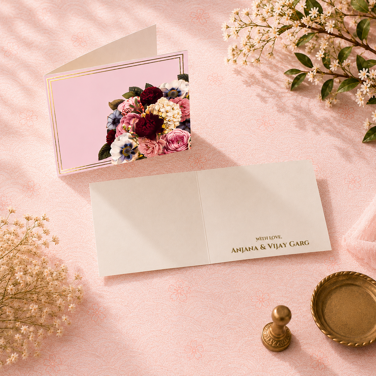 Luxury Blush Bloom folded card with soft pink floral artwork, gold border detailing, and elegant ivory interiors styled with delicate blooms.